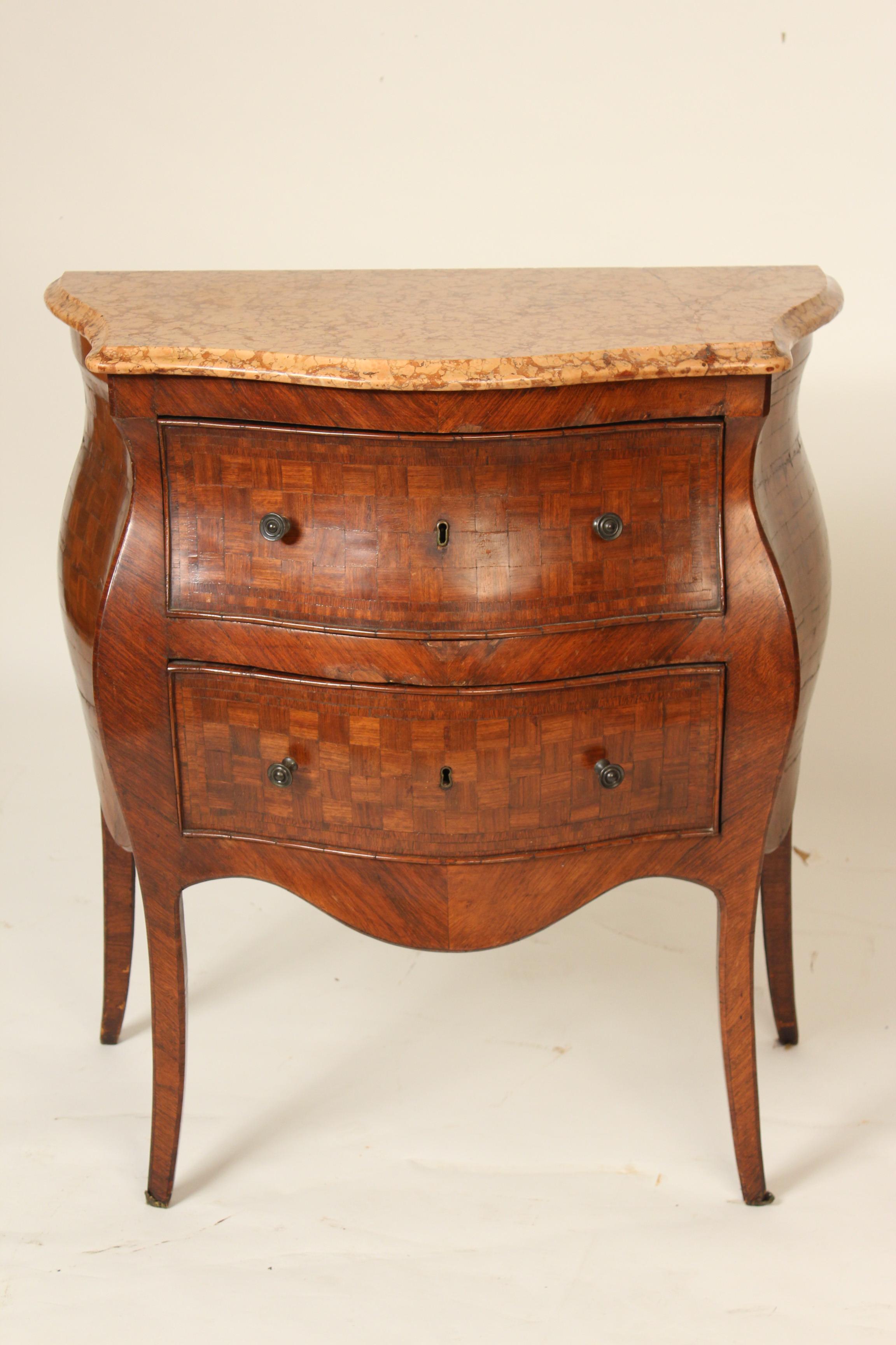 Continental antique Louis XV style parquetry inlaid bombe marble top commode, 19th century.