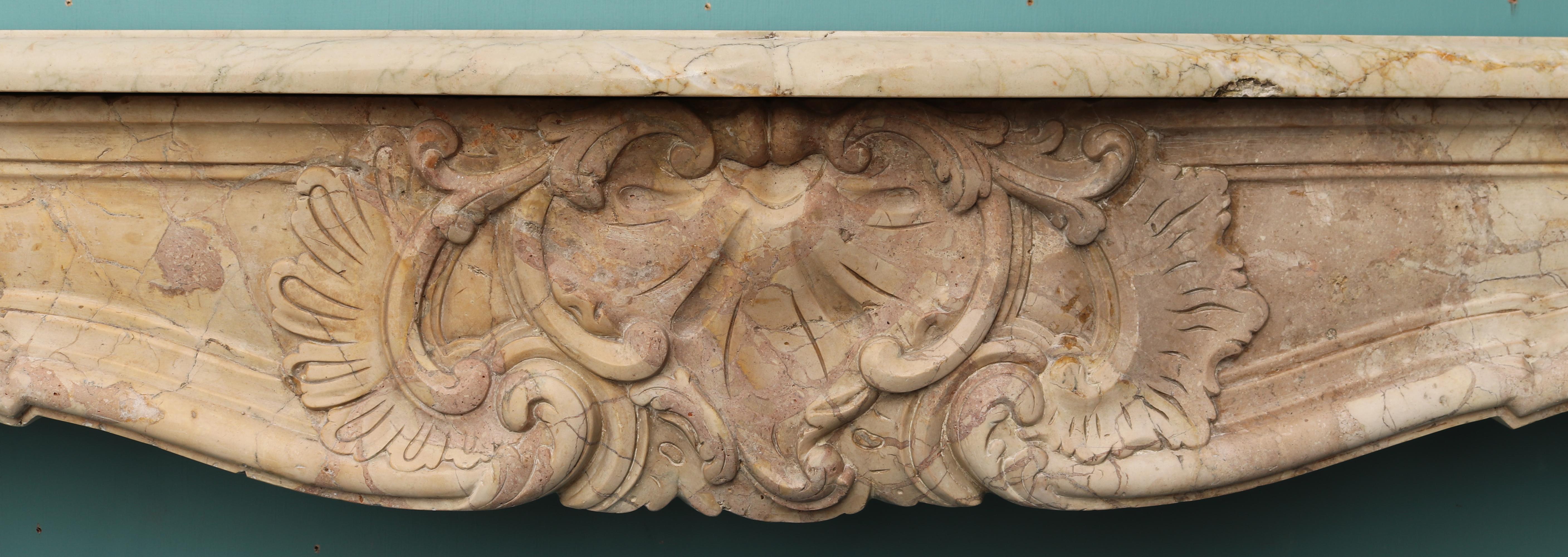 18th Century and Earlier Antique Louis XV Style Carved Sarrancolin Marble Mantel For Sale