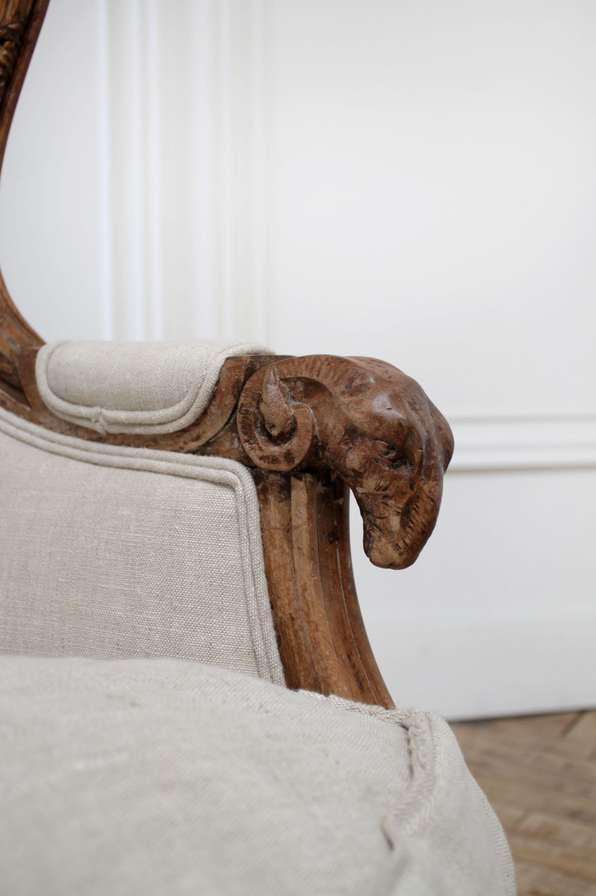 Antique Louis XV Style Carved Wing Chair Upholstered in Natural Linen In Good Condition In Brea, CA