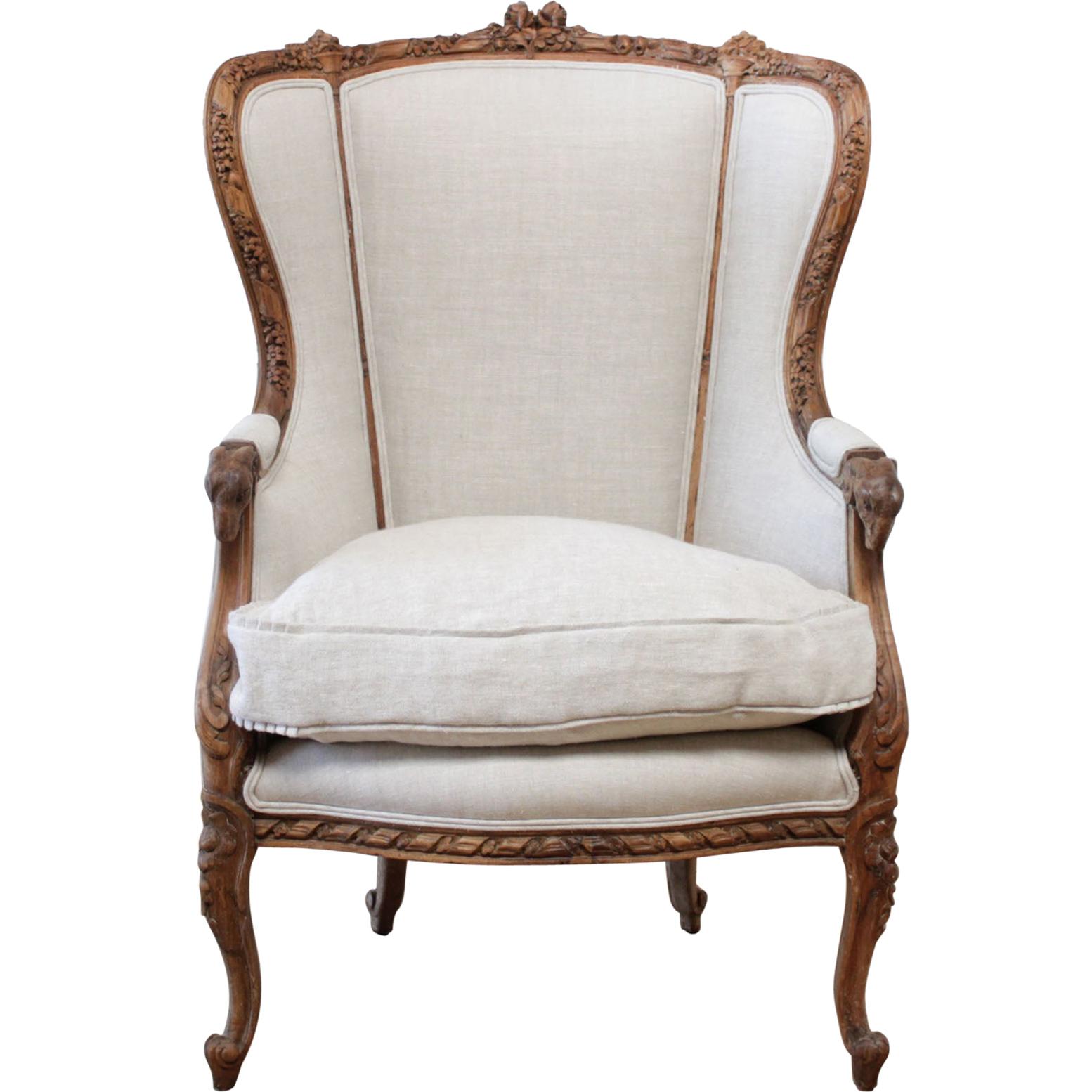 Antique Louis XV Style Carved Wing Chair Upholstered in Natural Linen