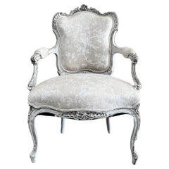 Used Louis XV style chair with linen upholstery