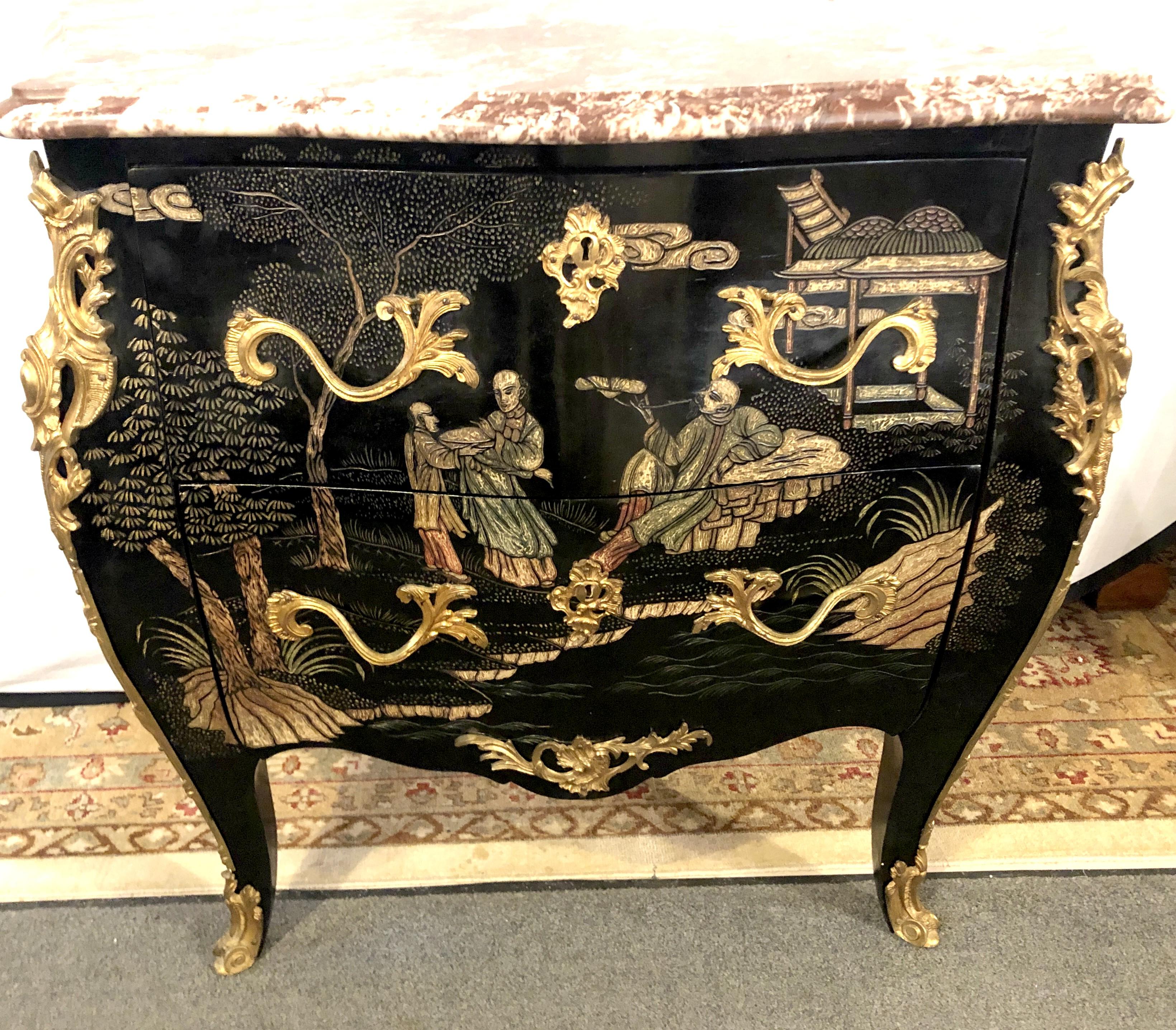 An antique Louis XV style ebonized and bronze-mounted bocbe chinoiserie marble-top commode or nightstand. This finely constructed commode has a bombe form with all over raised decorative design of vibrant colors supporting a marble top.