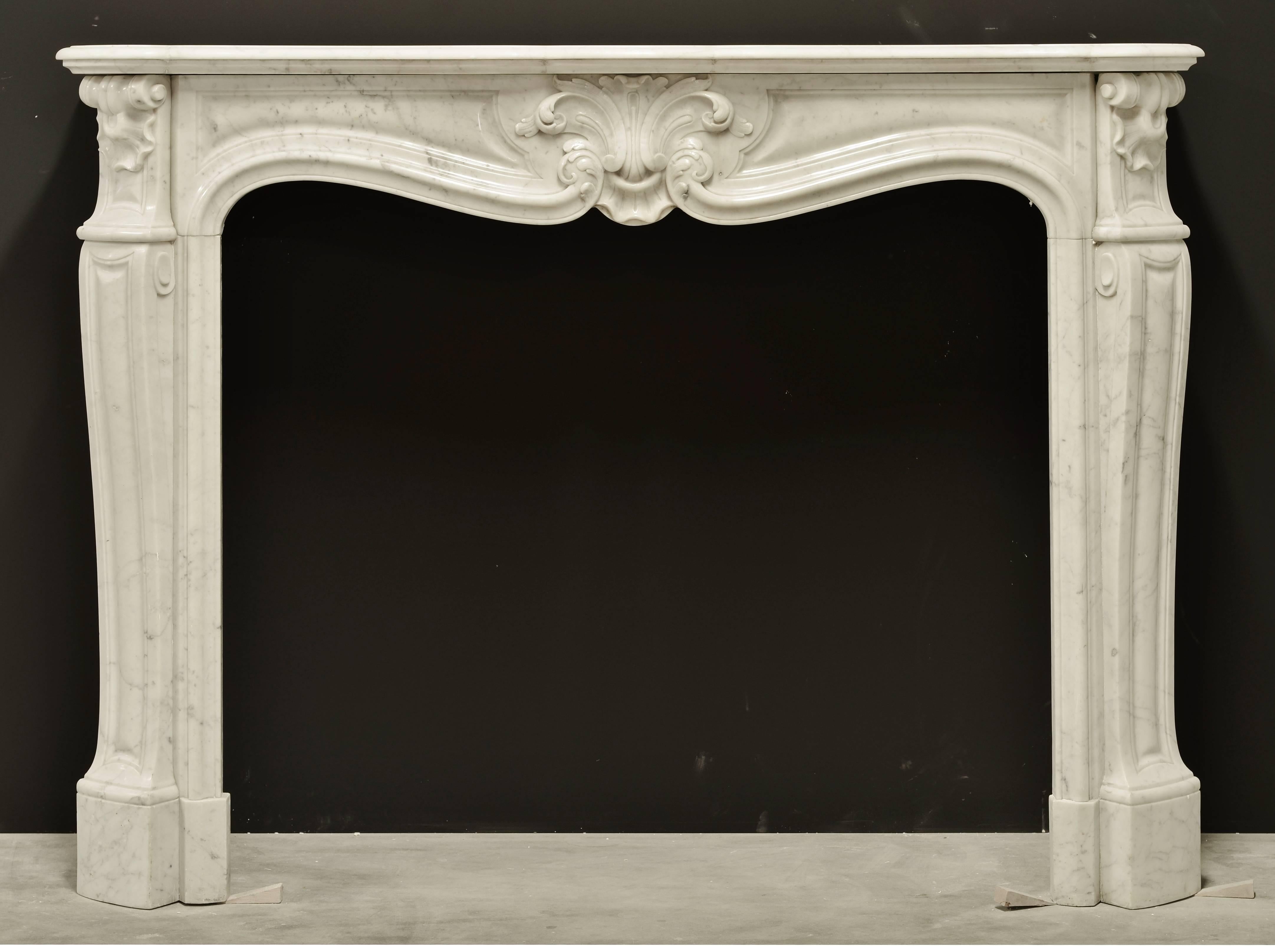 Beautiful decorative Parisian Louis XV fireplace mantel in Carrara white marble, 19th century, France.

Left side panels show minor yellowing. Overall excellent original condition.
Ready to be shipped and installed.


We can supply the correct