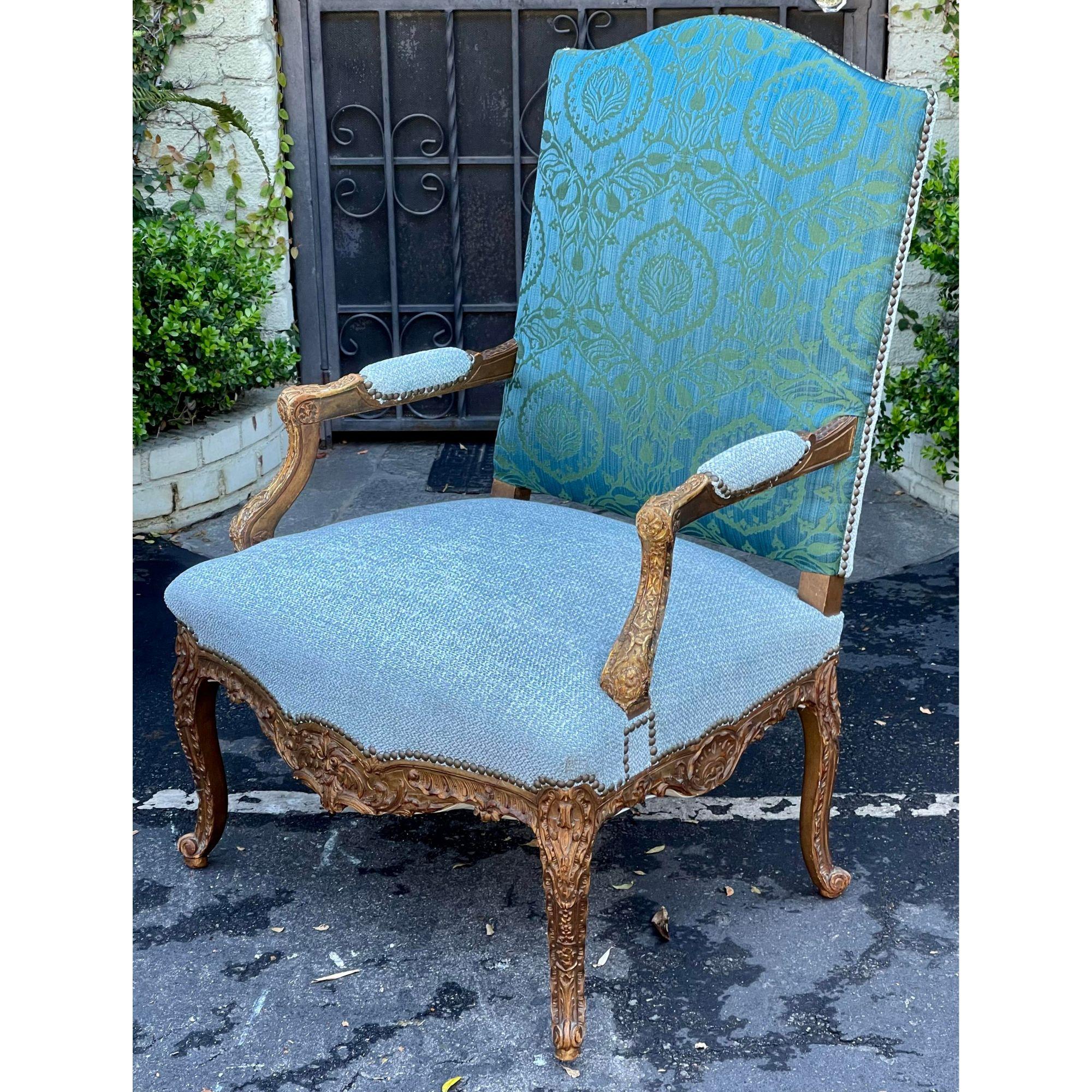 Antique Louis XV Style Giltwood Fauteuil arm chair.
The lumbar pillow is available but is not included.

Additional information:
Materials: Giltwood
Color: Blue
Period: 19th Century
Styles: Louis XV
Number of Seats: 1
Item Type: Vintage,