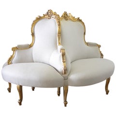 Antique Louis XV Style Giltwood Tete a Tete Settee Upholstered in Natural Linen