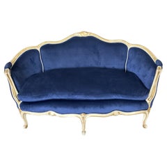 Ancienne banquette de style Louis XV peinte et dorée