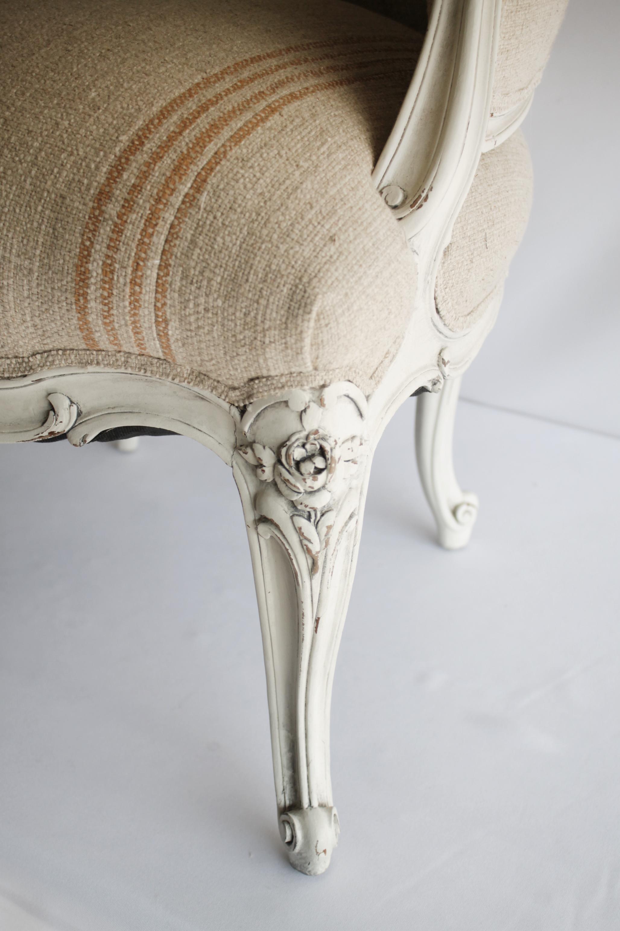 Antique Louis XV Style Painted French Bergère Chair with Linen Upholstery In Good Condition In Brea, CA