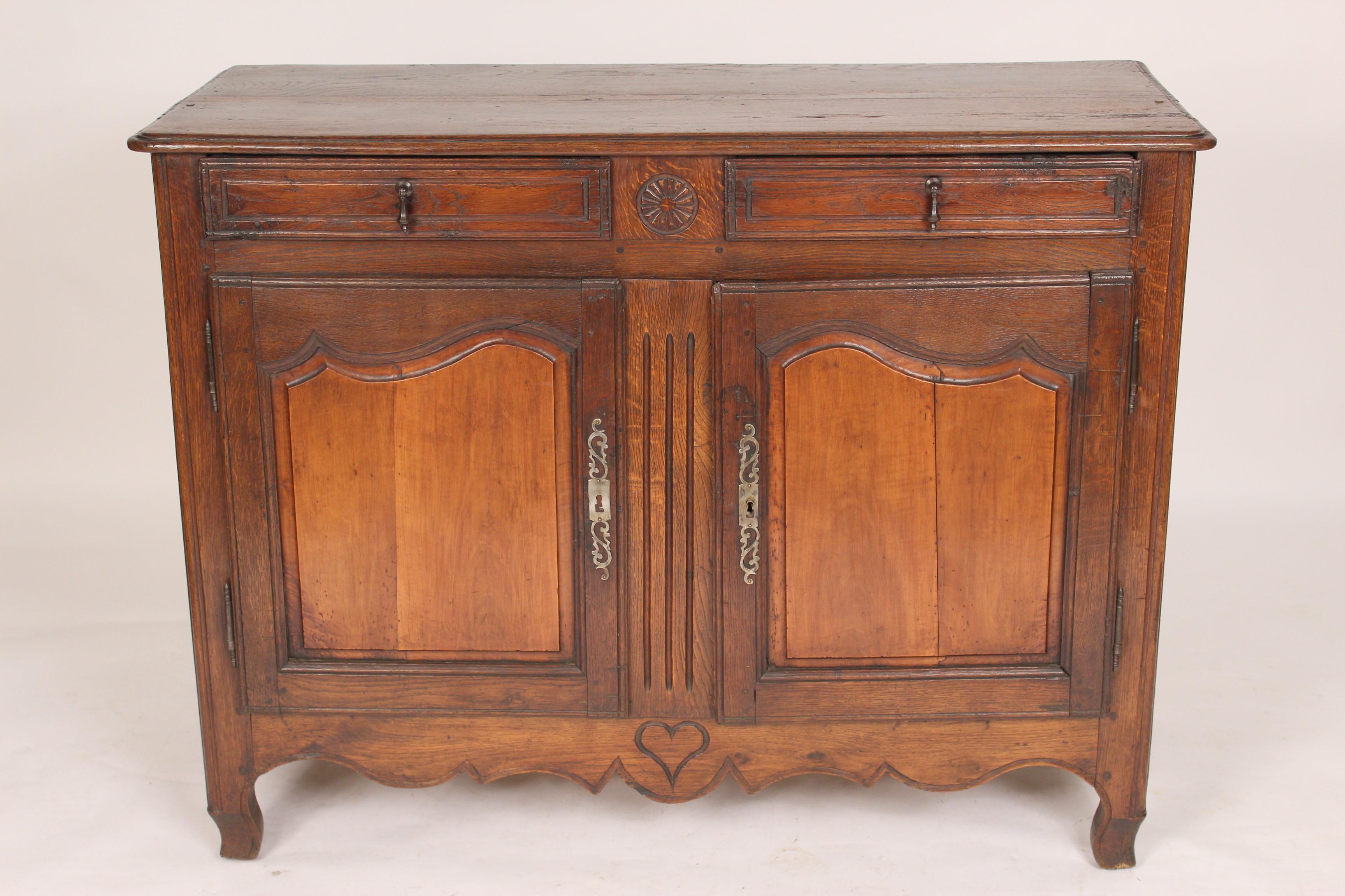 Antique Louis XV style provincial oak buffet with beech wood paneled doors, 19th century.