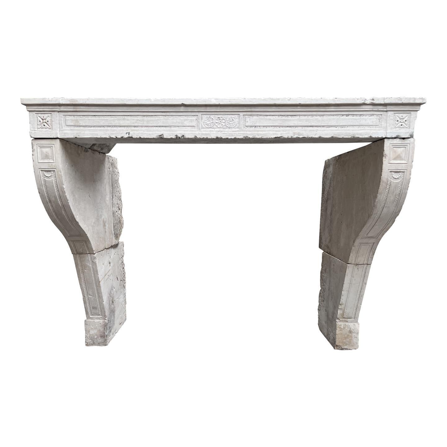 Antique Louis XVI French Limestone Fireplace Mantel, Early 19th Century For Sale