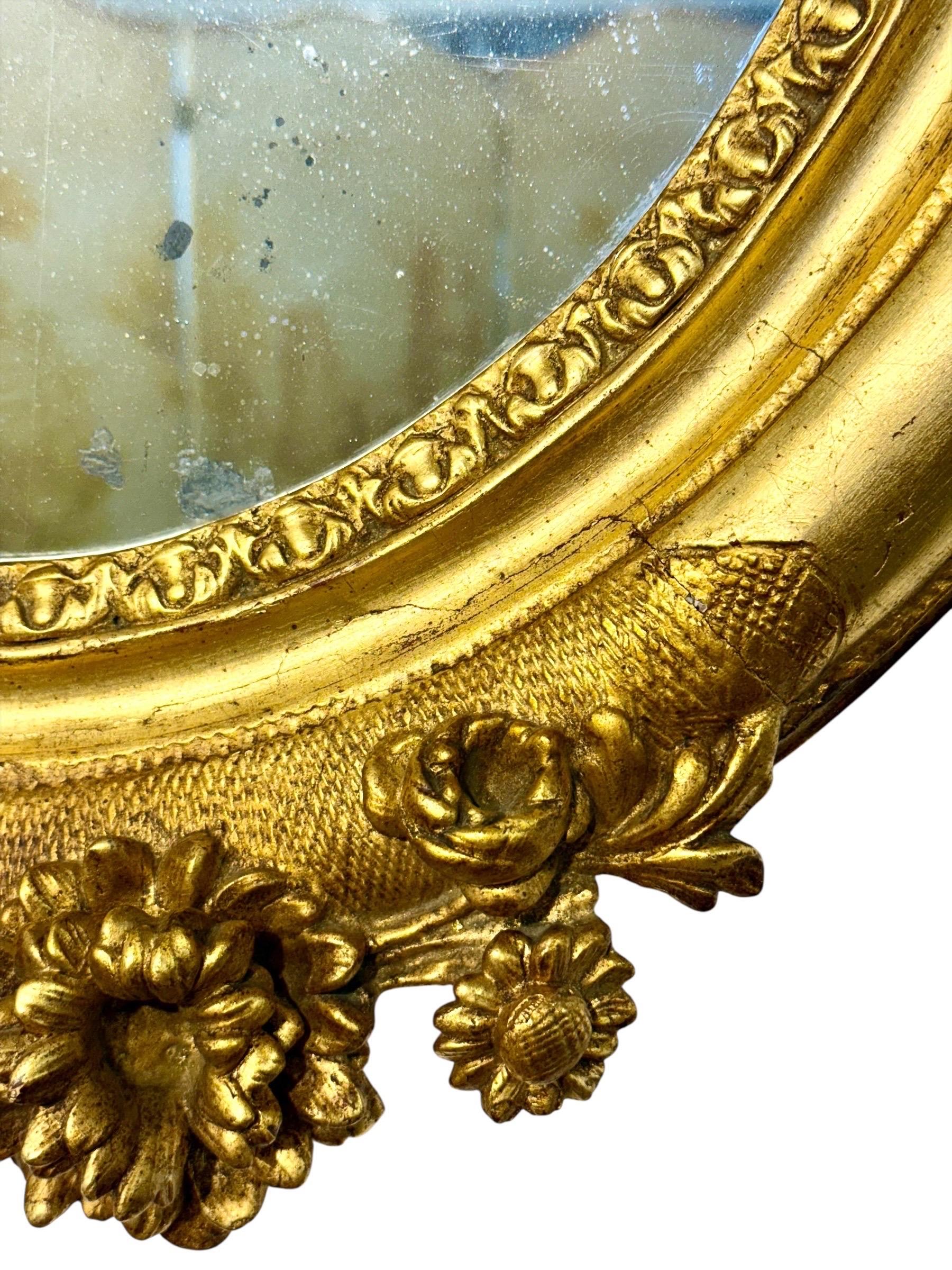 Antique Louis XVI Giltwood Oval Mirror with Floral Carving For Sale 8