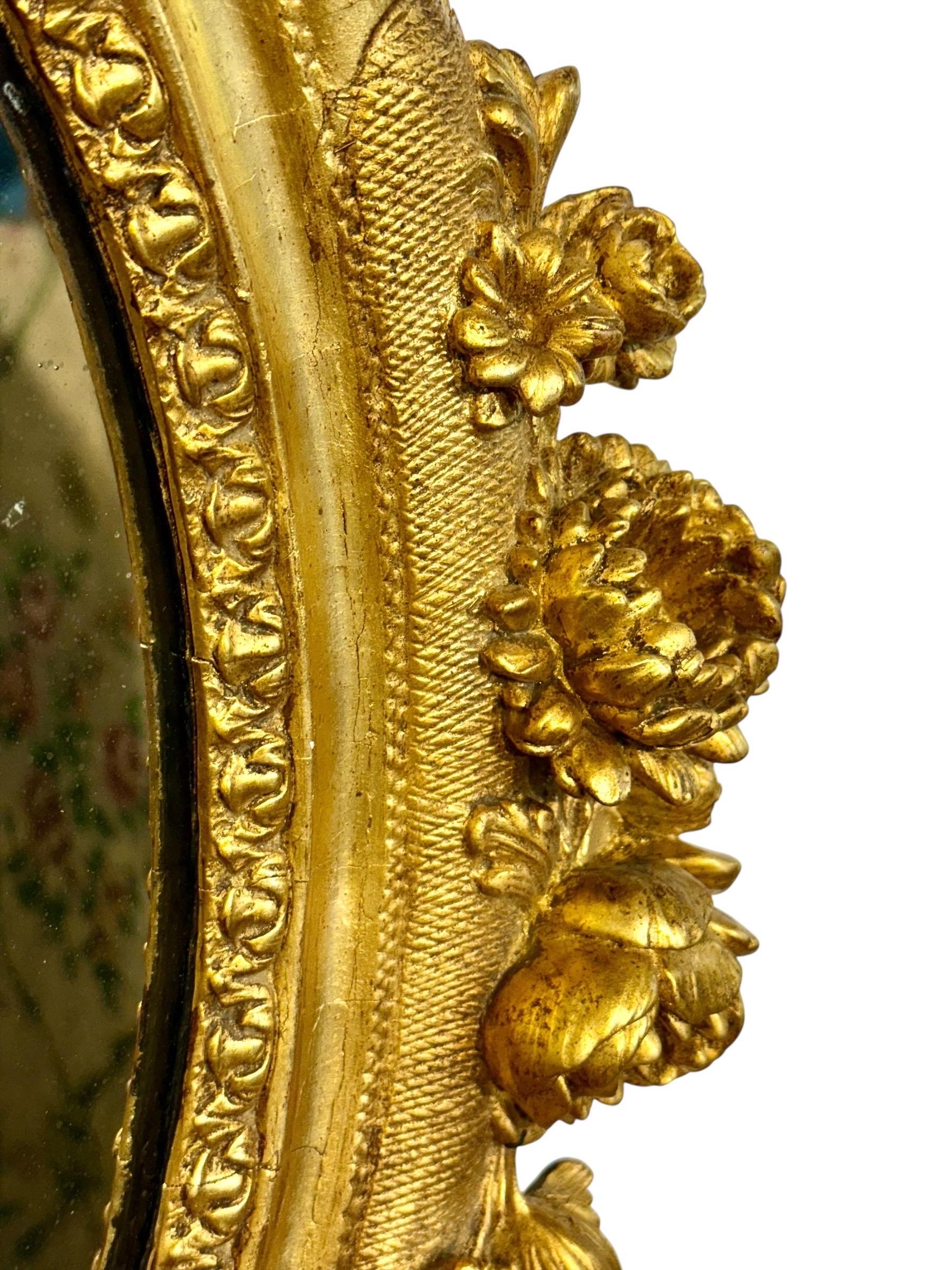 Antique Louis XVI Giltwood Oval Mirror with Floral Carving For Sale 1