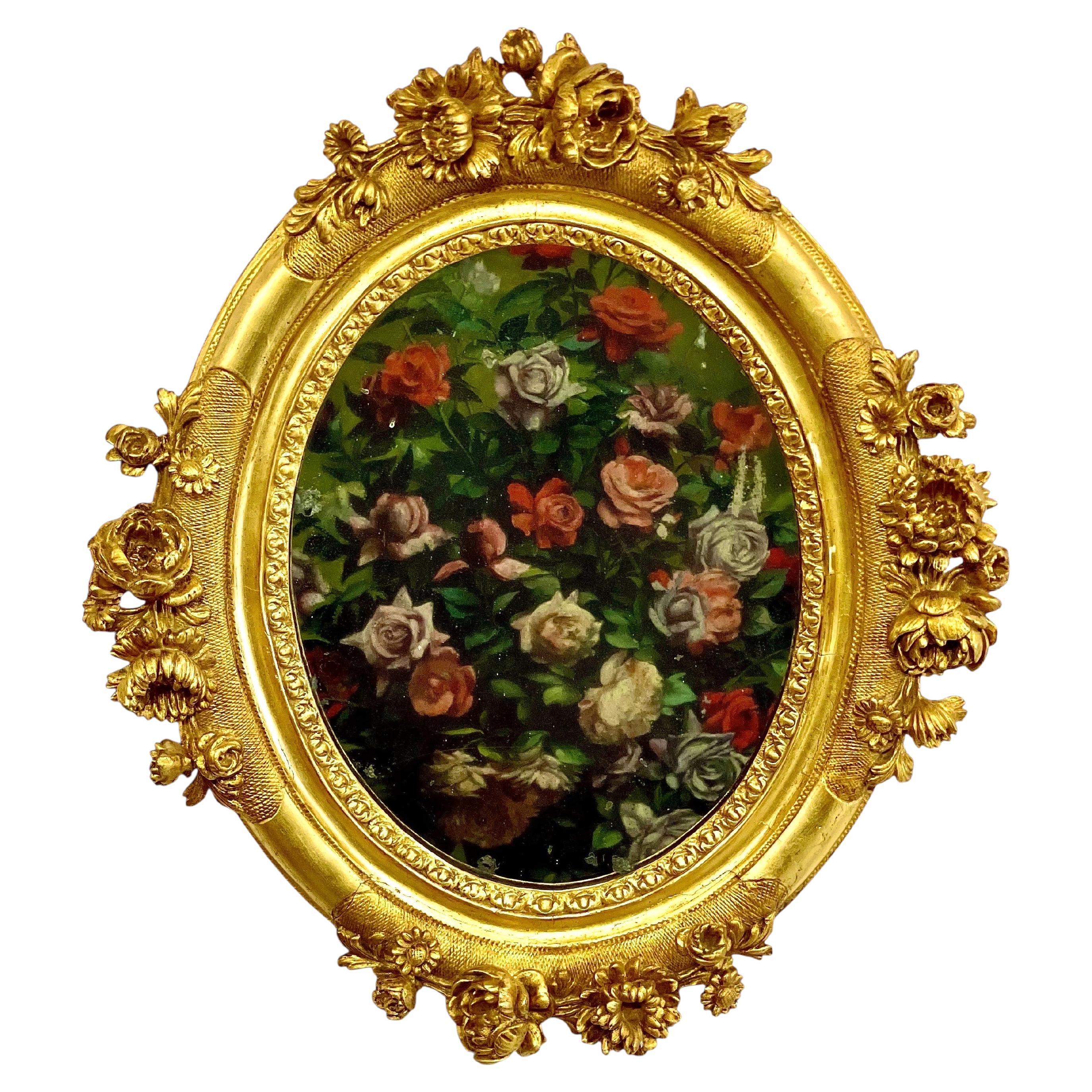 Antique Louis XVI Giltwood Oval Mirror with Floral Carving For Sale
