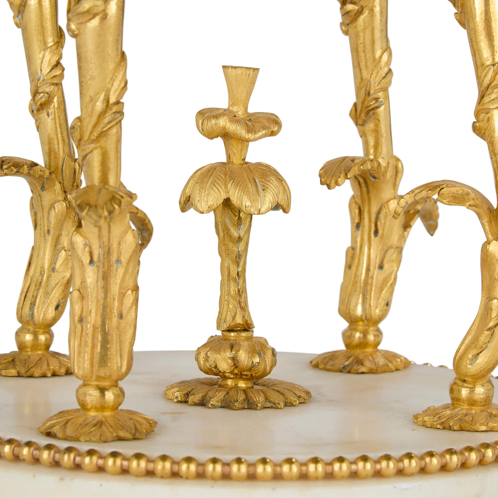 XVIII secolo Antico orologio da camino Luigi XVI in marmo, oro e bronzo dorato Cercle Tournant in vendita