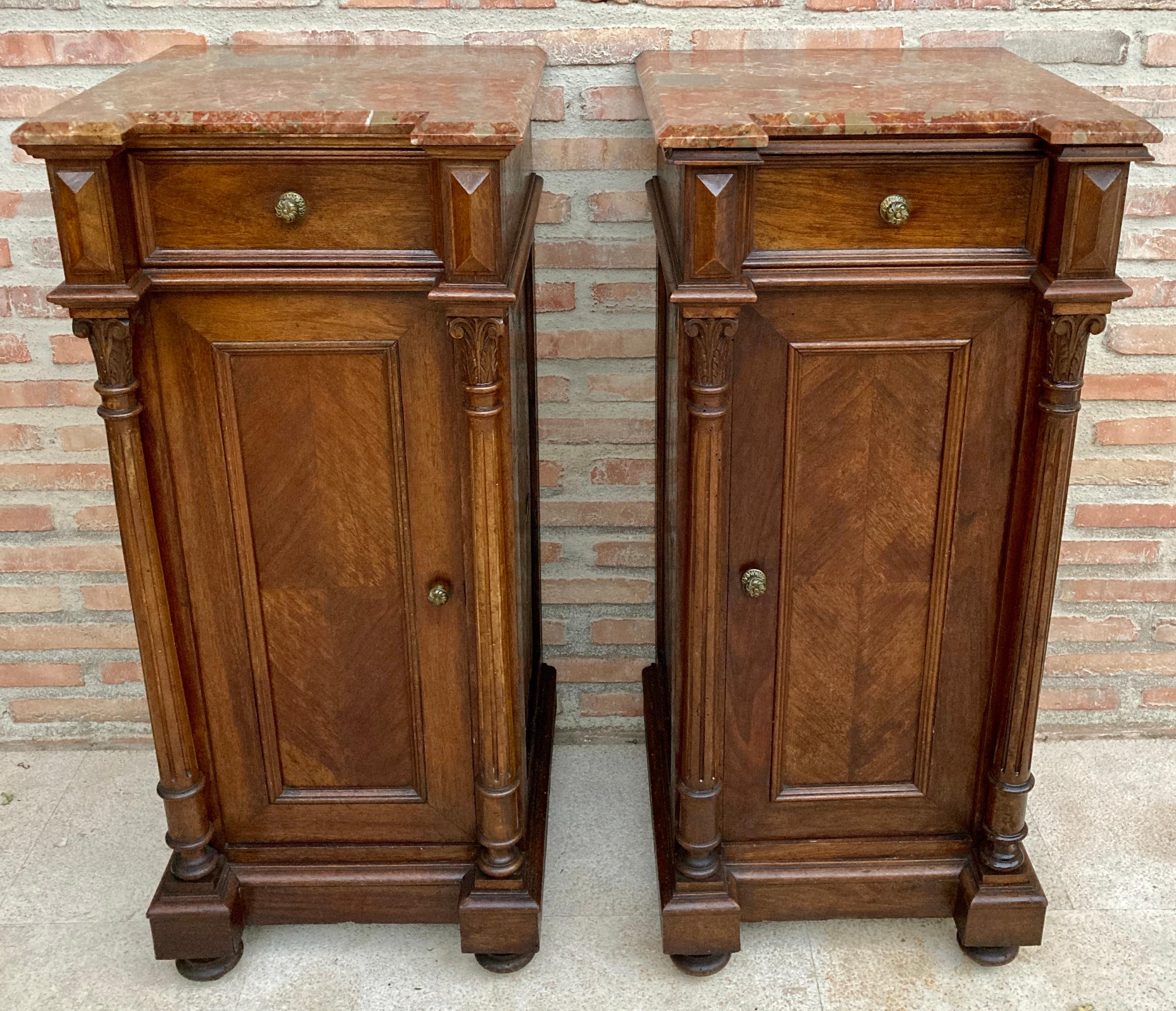 Pair of French Louis XVI side cabinets with side columns with acanthus leaf decoration, late 19th century.
Red marble top.
Bedside tables with a drawer and a front door with an interior shelf.
Good old condition with small signs of use for its age.