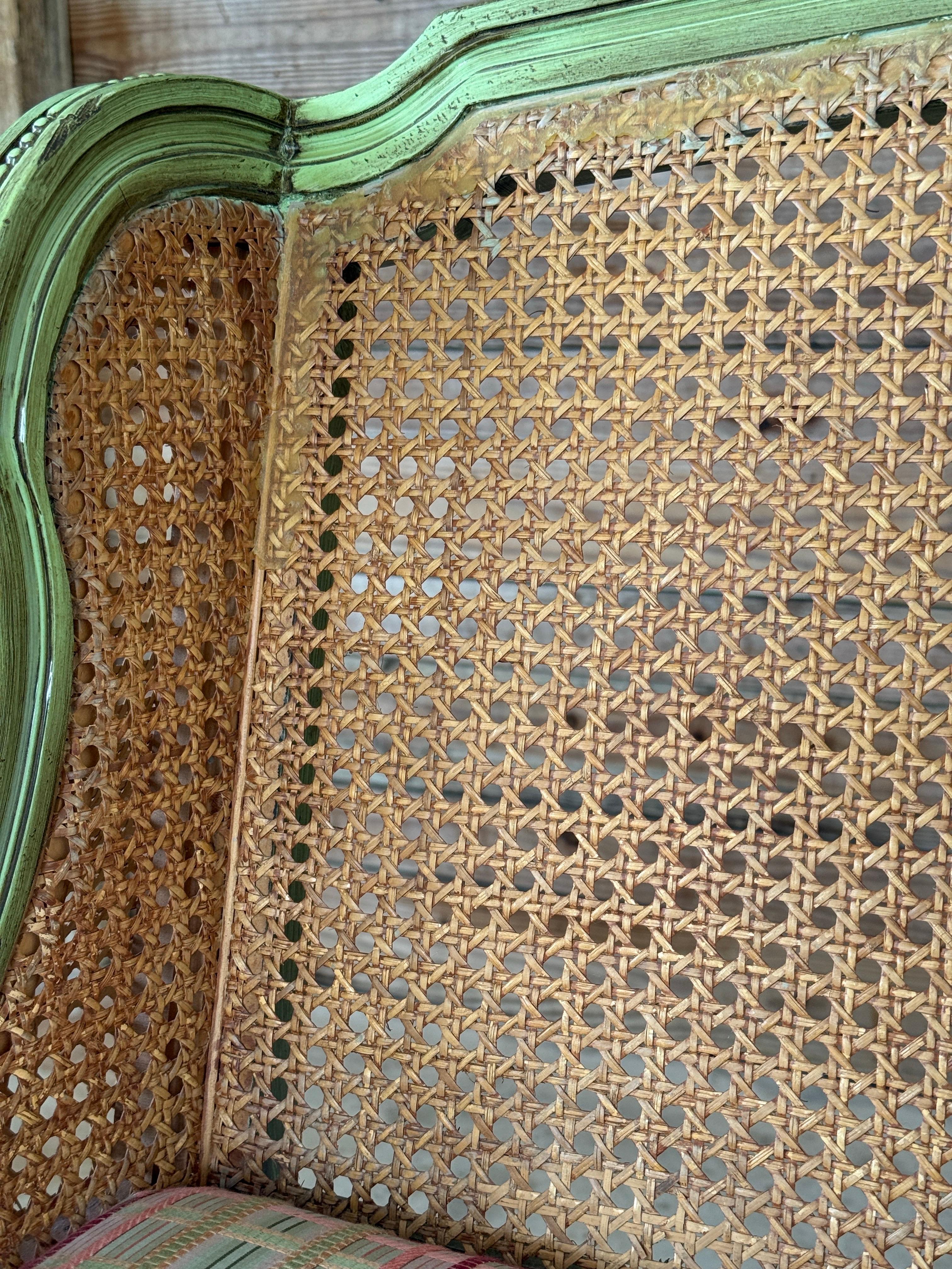 20th Century Antique Louis XVI Style Caned Settee With Distressed Green Painted Finish For Sale