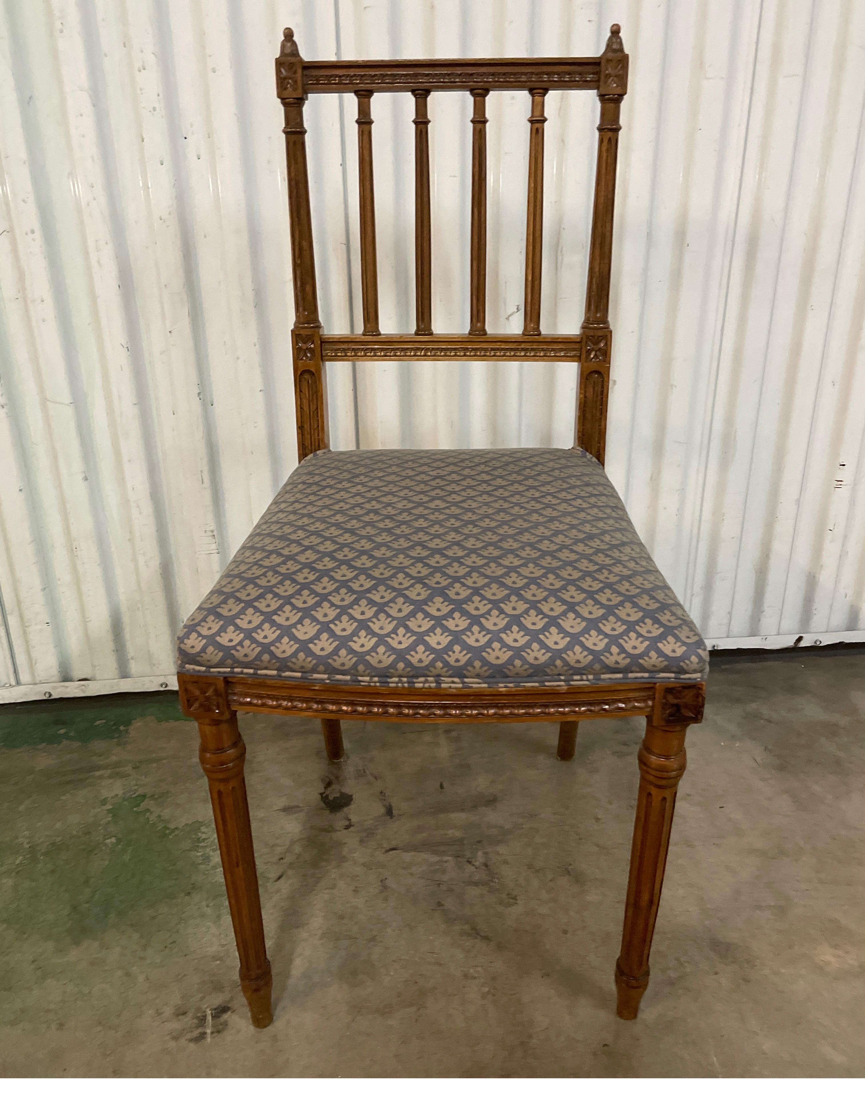 Louis XVI style Chiavari side chair with newly upholstered seat in Fortuny fabric.