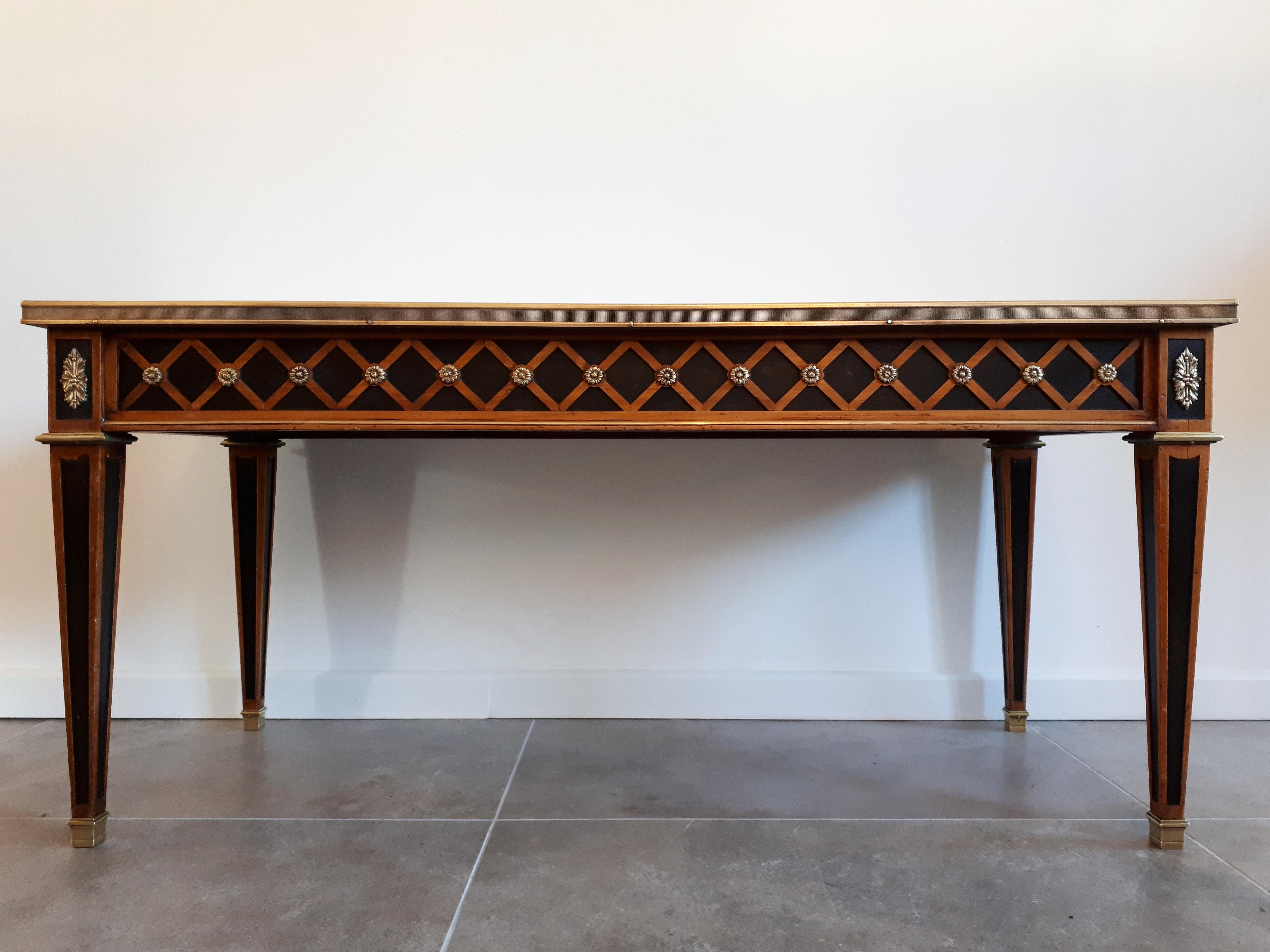 Antique coffee table with bronze contour and ornaments, white Carrara marble top and lozenge pattern marquetry.