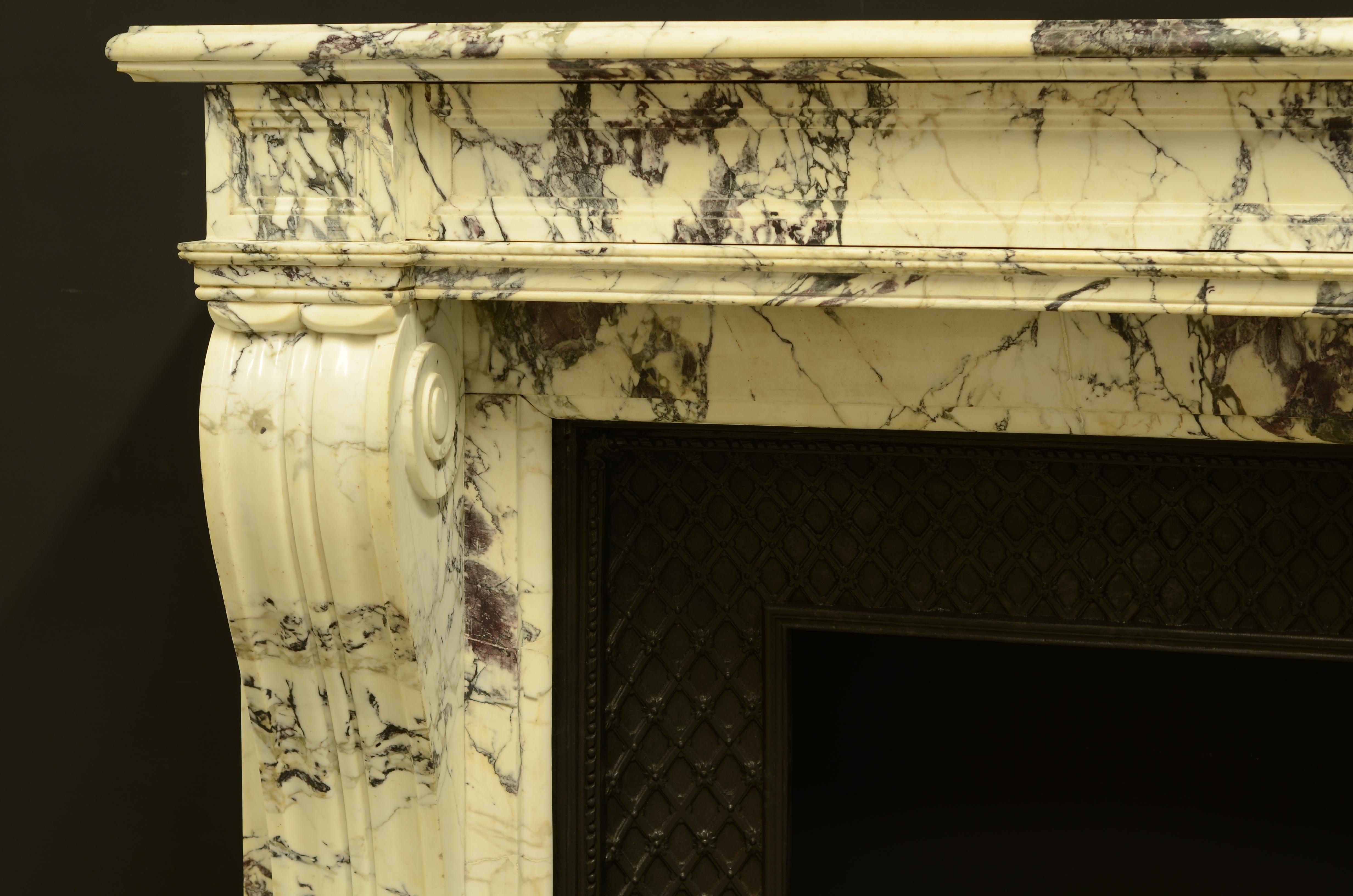 Nice French Louis XVI fireplace mantel in Italian paonazzetto marble.
The mantel comes with a cast iron insert.

Opening fireplace: 83 x 94 (height x width) in cm.
Opening Insert: 63 x 59 (height x width) in cm.

Due to the weakness of the