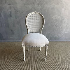 Antique Louis XVI Style French cane back chair in Oyster White Finish