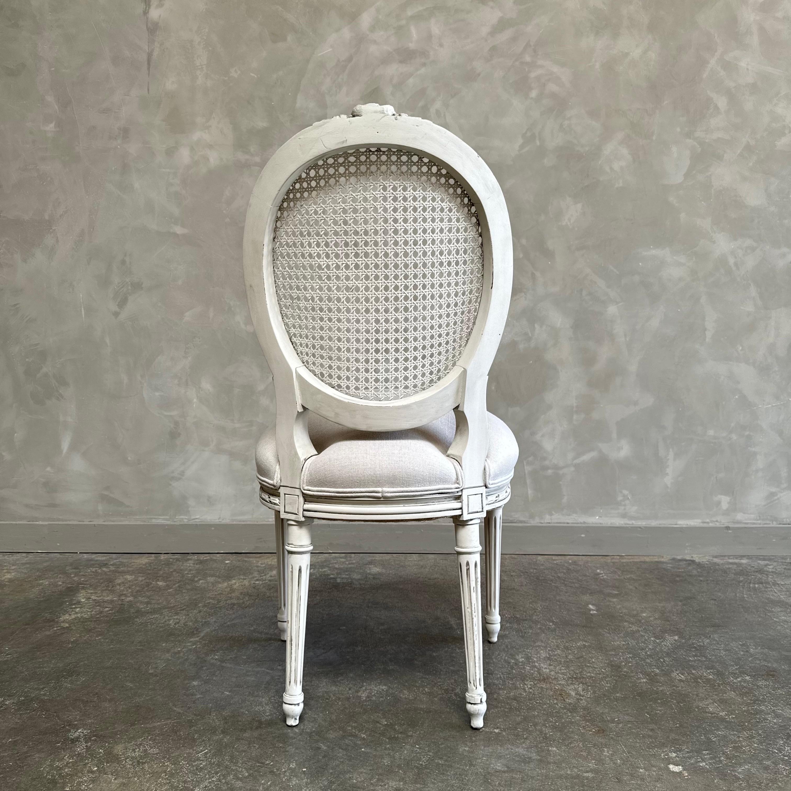 Linen Antique Louis XVI Style French cane back chair in Oyster White Finish For Sale