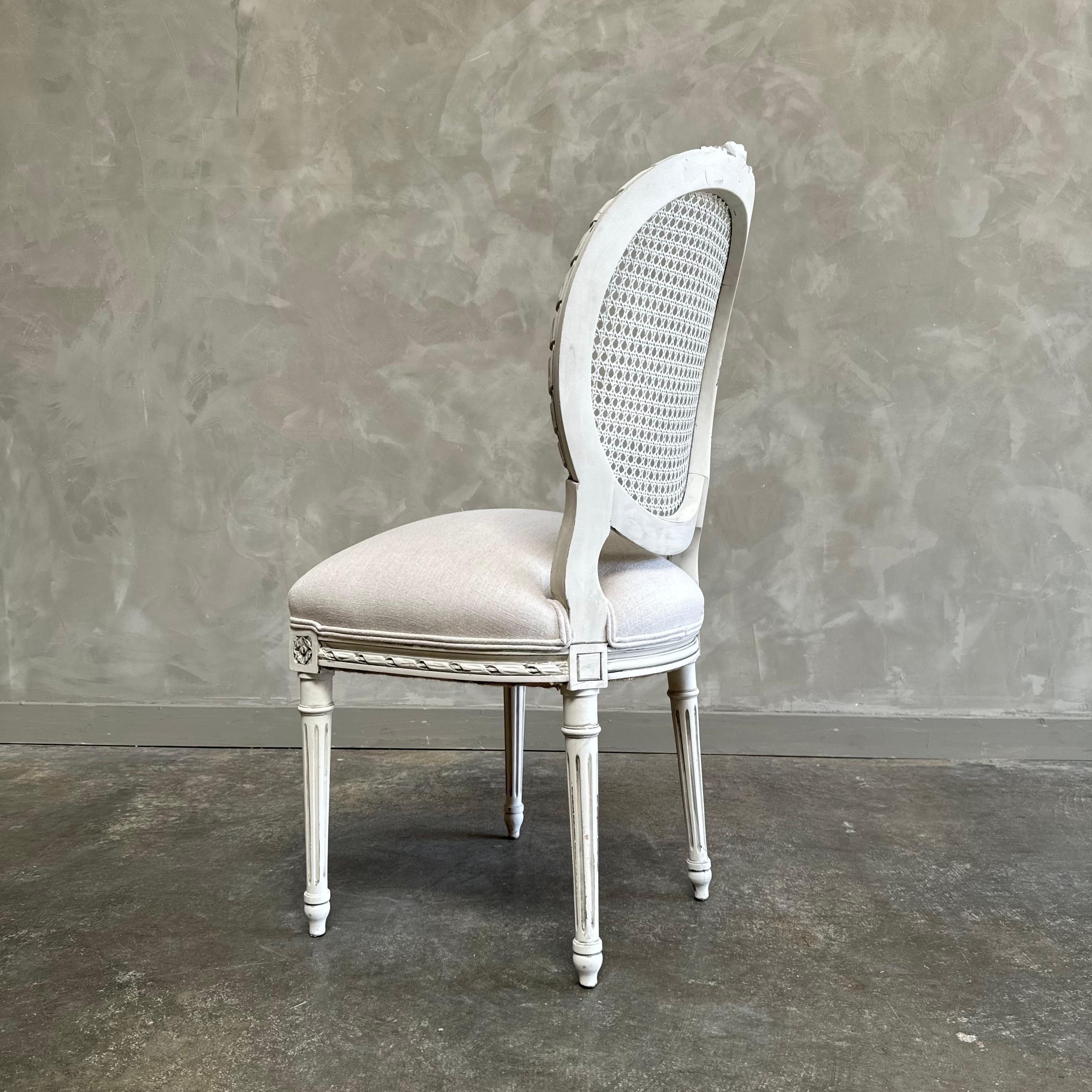 Linen Antique Louis XVI Style French cane back chair in Oyster White Finish