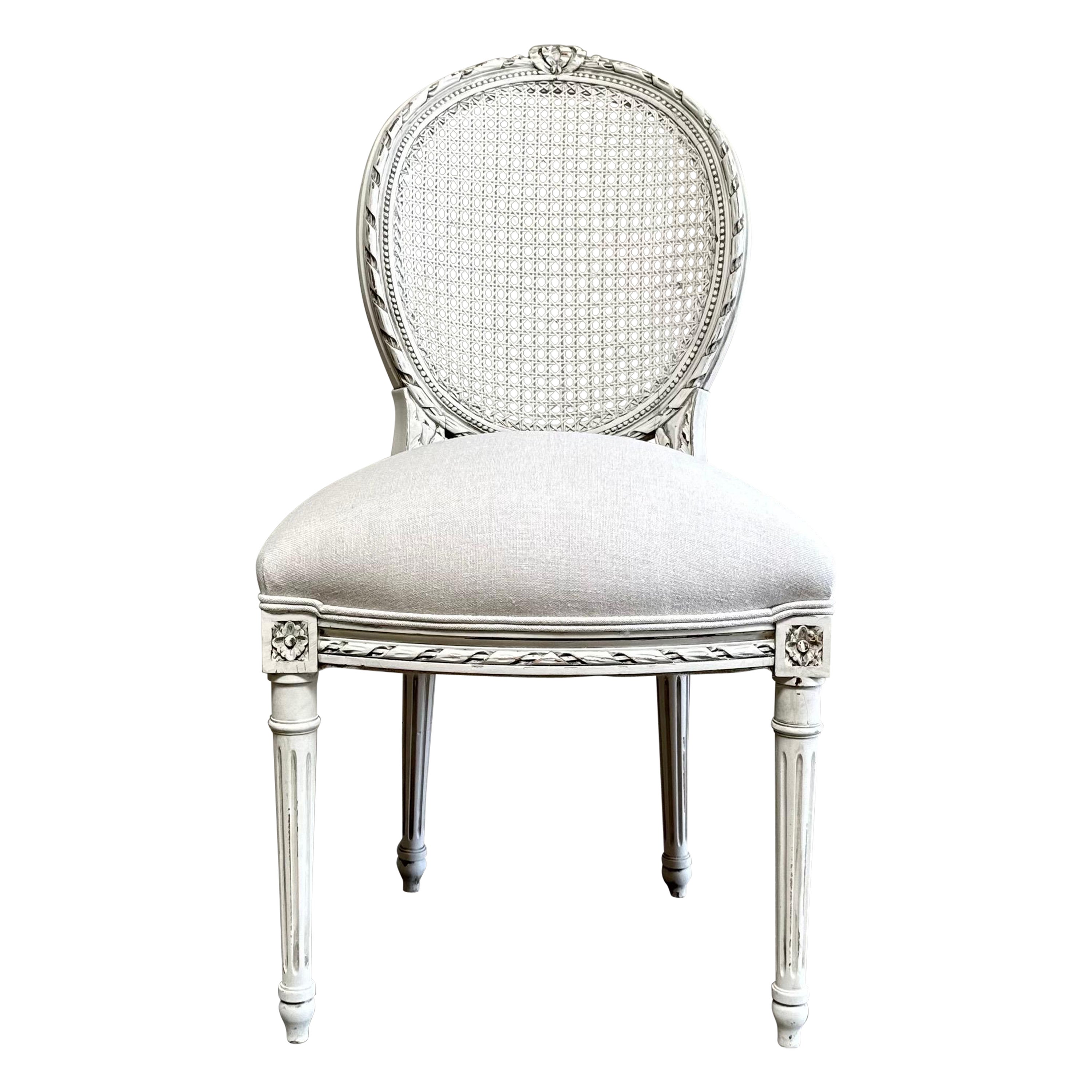 Antique Louis XVI Style French cane back chair in Oyster White Finish