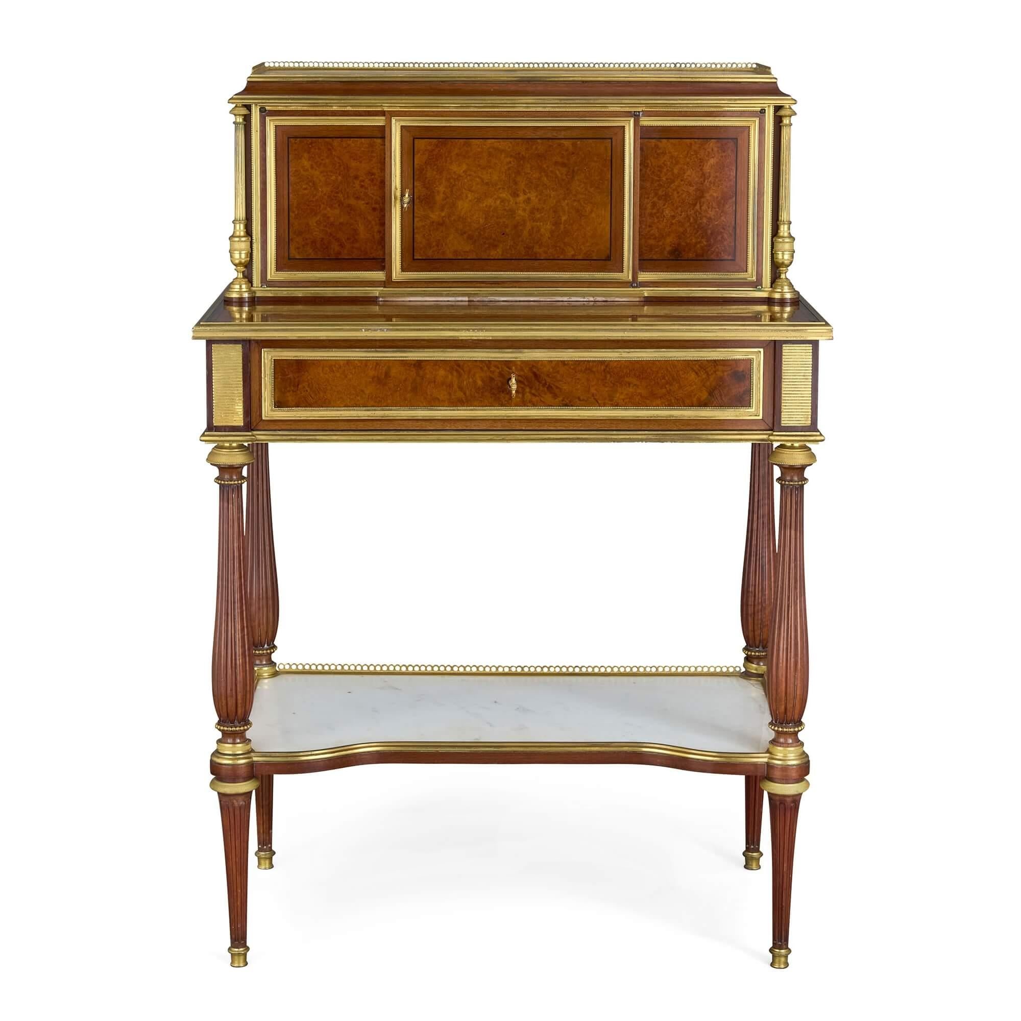 Antique Louis XVI style mahogany and ormolu bonheur du jour by Winckelsen
French, 1864
Height 105cm, width 73cm, depth 42cm

Charles-Guillaume Winckelsen (French, 1812-1871) is the craftsman responsible for this outstanding bonheur du jour. The