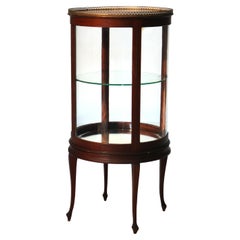 Vitrine ronde de style Louis XVI, en acajou, verre et bronze doré, vers 1910