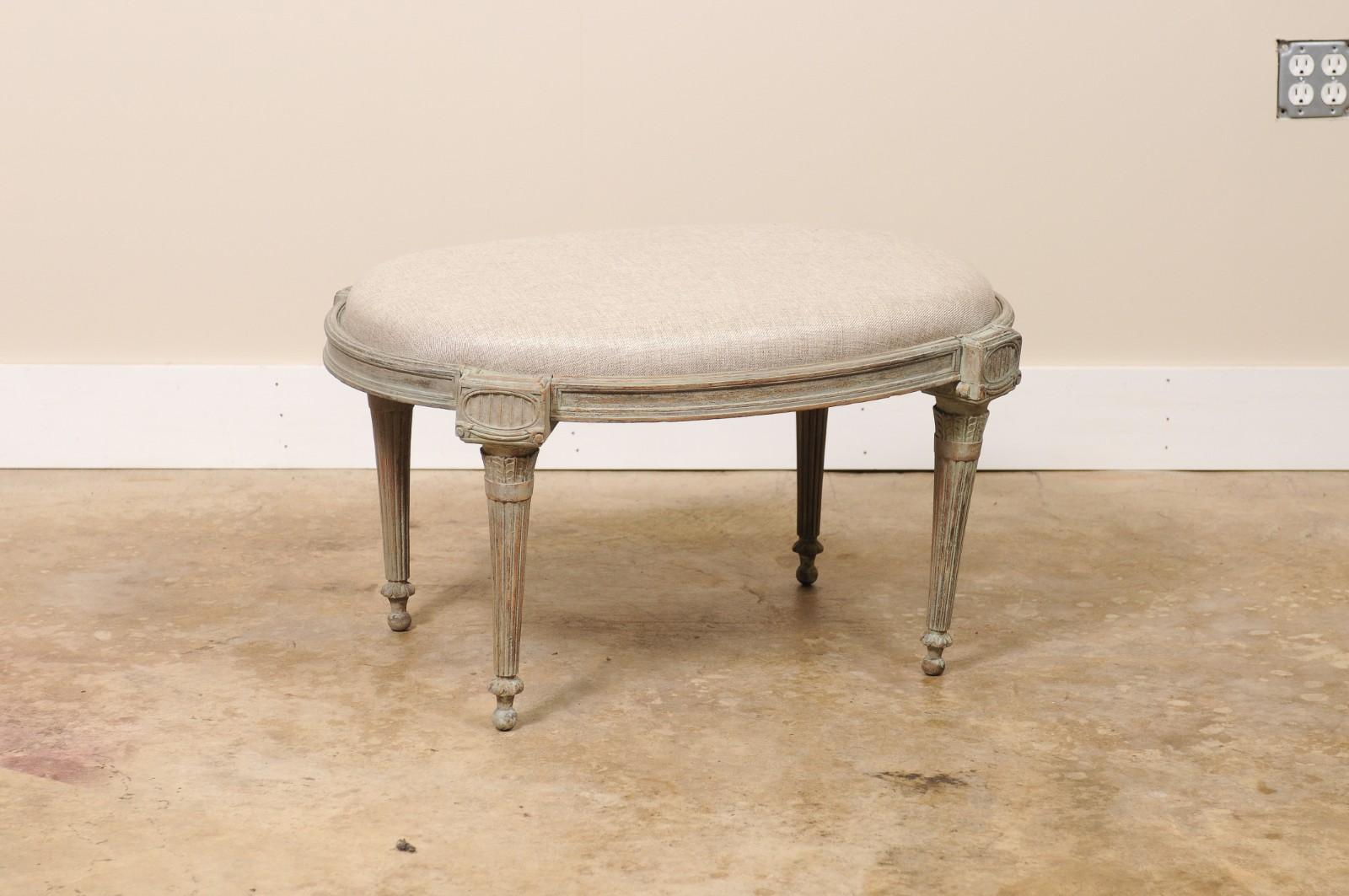 French Louis XVI Style Oval Stool or Ottoman

Beautifully painted and newer upholstery.


