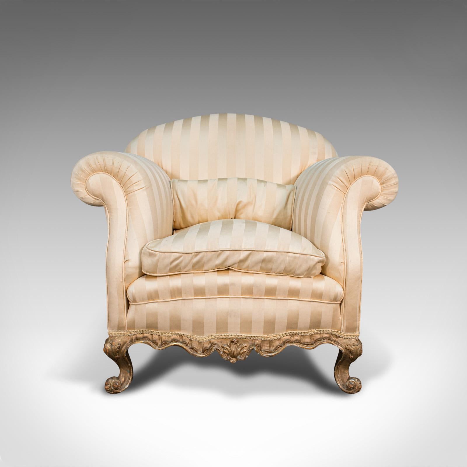 This is an antique lounge armchair. A French, textile and beech tub seat, dating to the late Victorian period, circa 1900.

Offers lasting antique elegance for the living room
Displaying a desirable aged patina - ready to be enjoyed as is or