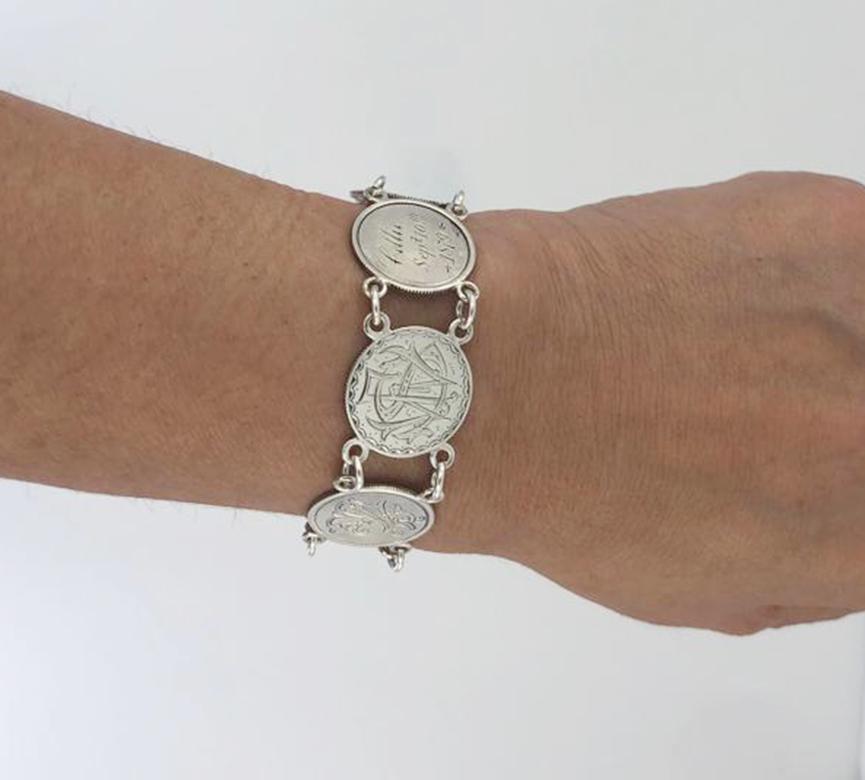 Antique Love Token Sterling Coin Bracelet In Excellent Condition In New York, NY