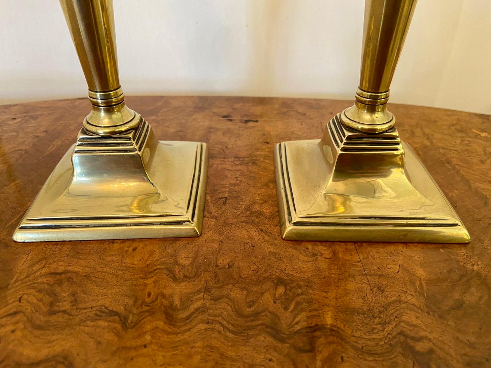 Antique Georgian brass candlesticks having an attractive gunbarrel column with a round sconce and a square stepped base.

In lovely original condition.

Measures: H 20cm
W 8.5cm
D 8.5cm
1800.
  