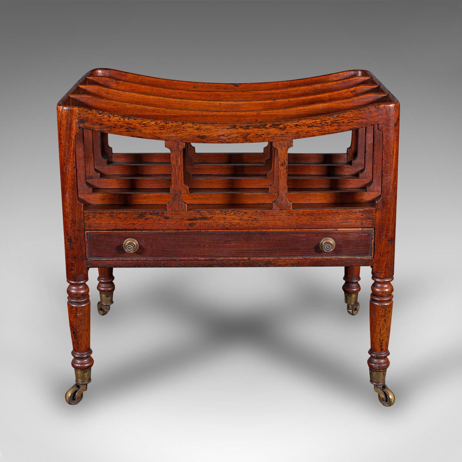 
This is an antique low profile Canterbury. An English, mahogany 4 division newspaper or magazine stand, dating to the Regency period, circa 1820.

Delightful concave form and rich colour accentuate this Regency example
Displays a desirable aged