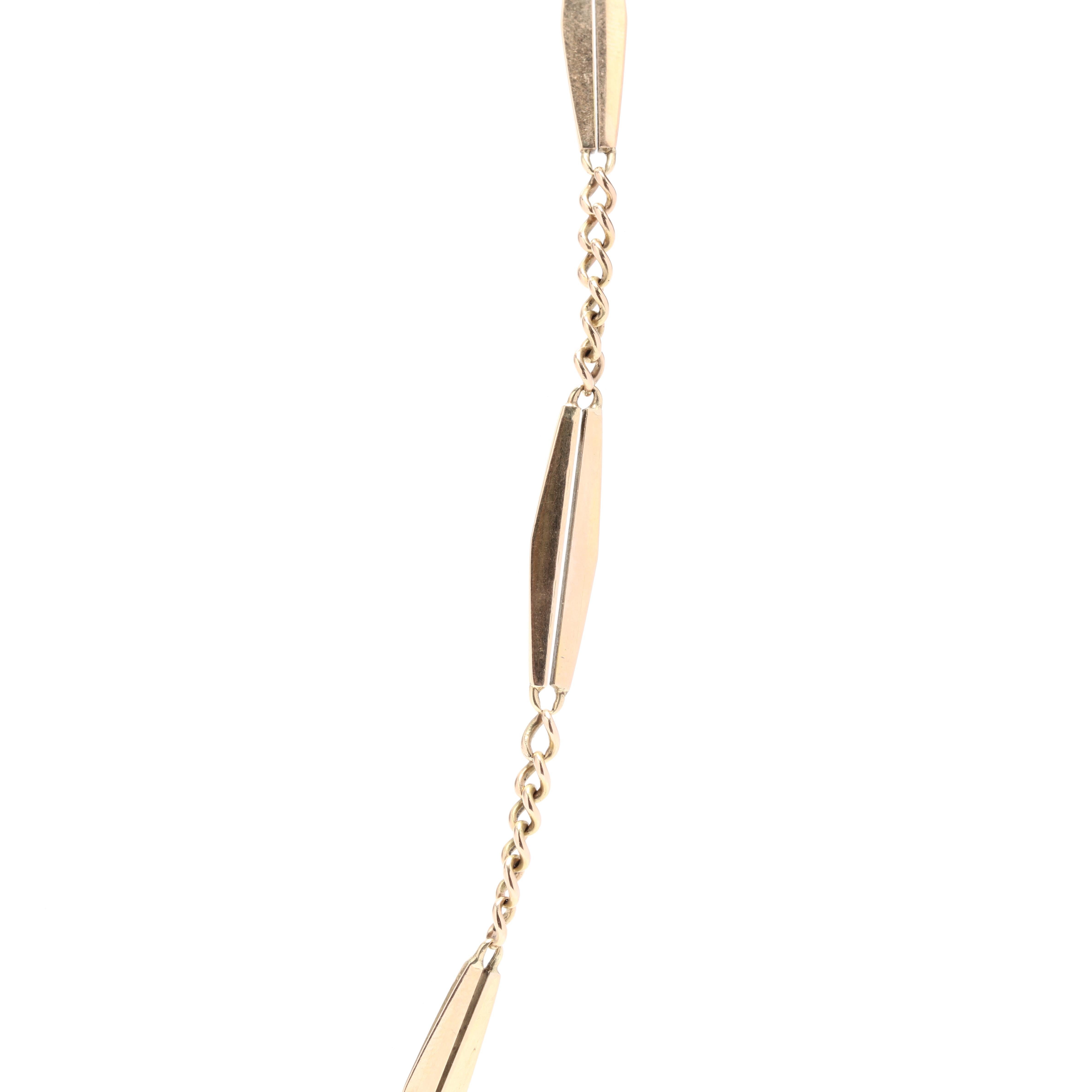 An antique Austro-Hungarian 14 karat yelow gold lozenge link watch chain. This chain features an alternating design of split lozenge links with curb link stations and a dog clip clasp. This chain has Austro-Hungarian hallmarks.

Length: 21.25