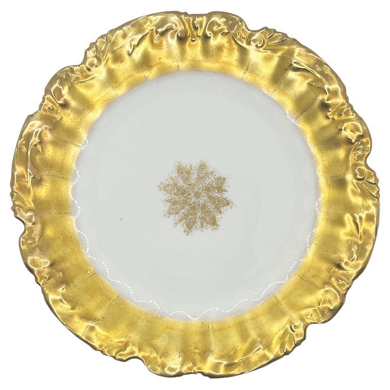 Antique Limoges Porcelain Plates with Ornate Gold Gilding and Intricate Snowflake Medallion Design

This breathtaking set of antique porcelain plates is by Coiffe made in Limoges France. This set of 6 pieces embodies the height of French elegance