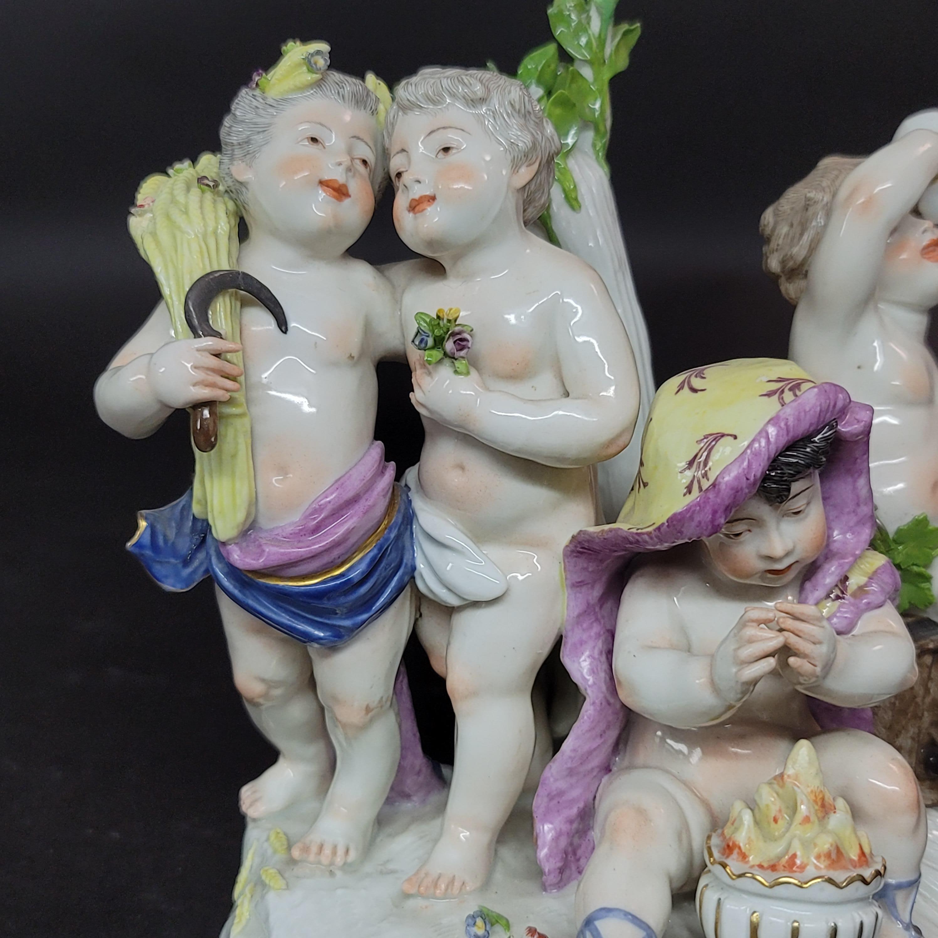A 19th cent porcelain group by Ludwigsburg depicts a group of frolicking putti angels, completed with hand-painted accents and a glossy glaze. Stamped along the underside with Ludwigsburg mark.
  