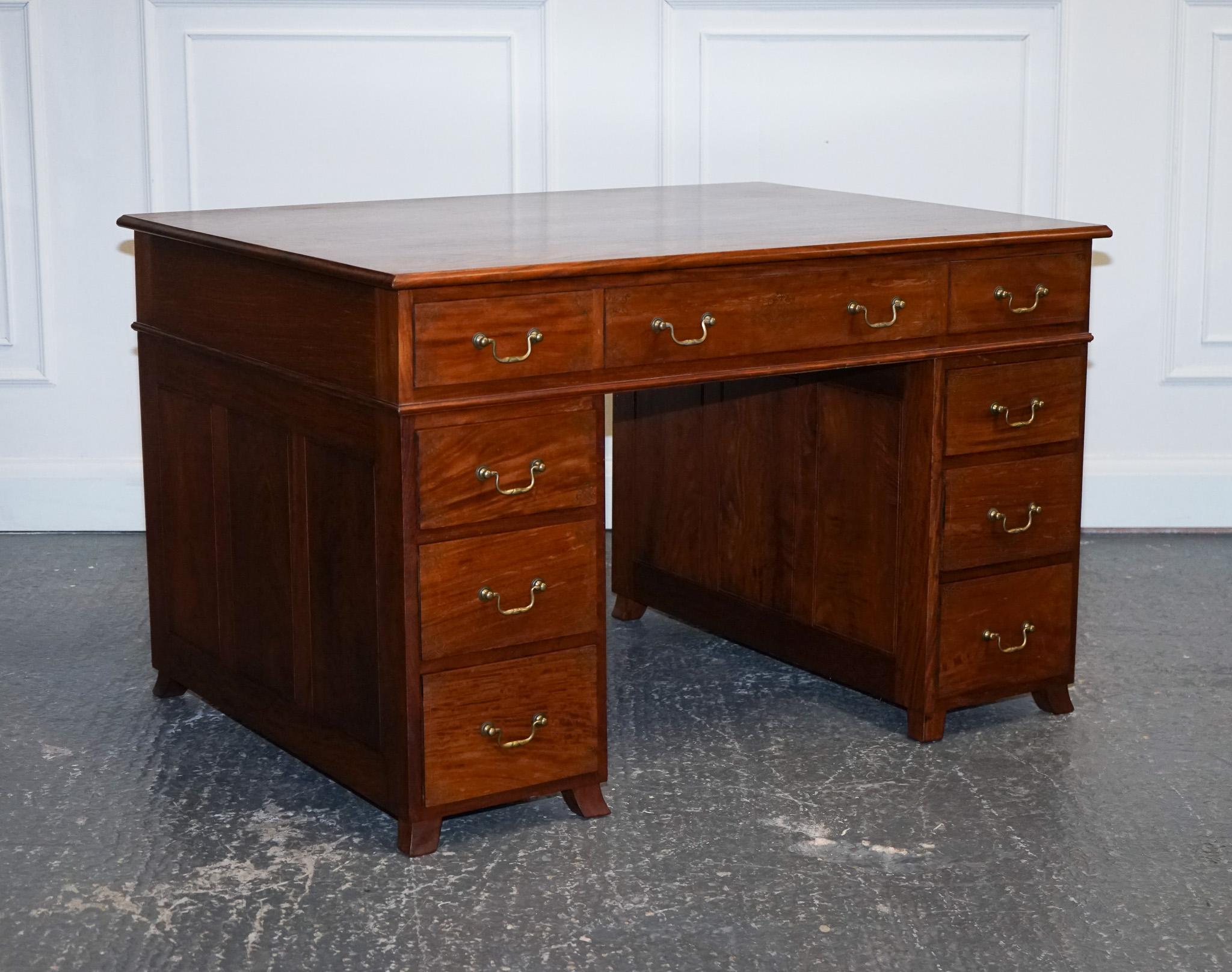 We are delighted to offer for sale this Stunning M. Hayat & Bros Anglo Indian Twin Pedestal Desk.

The M. Hayat & Bros Anglo Indian Twin Pedestal Partners Desk is an exquisite piece of furniture that exudes elegance and class. This desk is