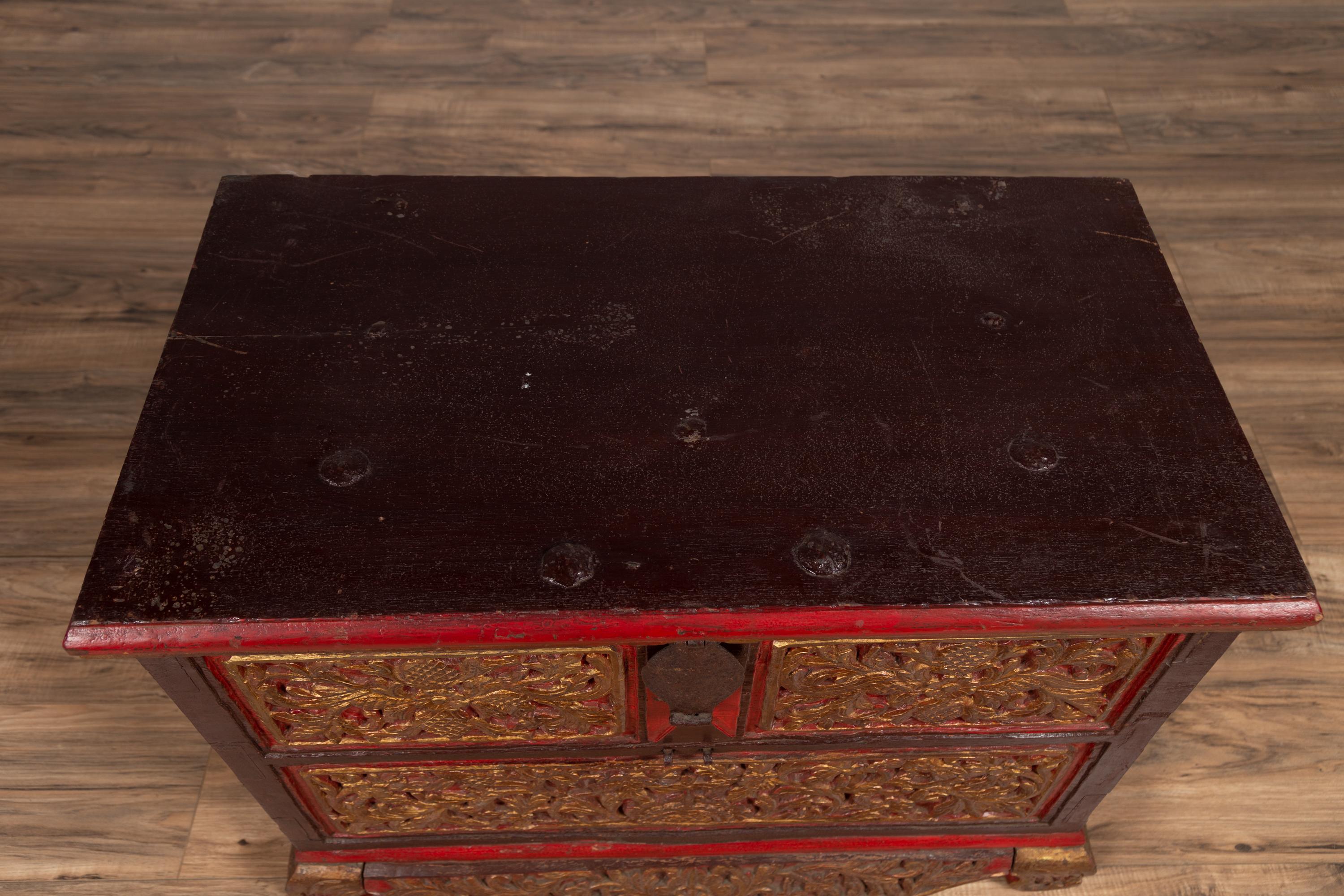 Antique Madura Hand Carved Wooden Blanket Chest with Red, Brown and Gilt Accents For Sale 9