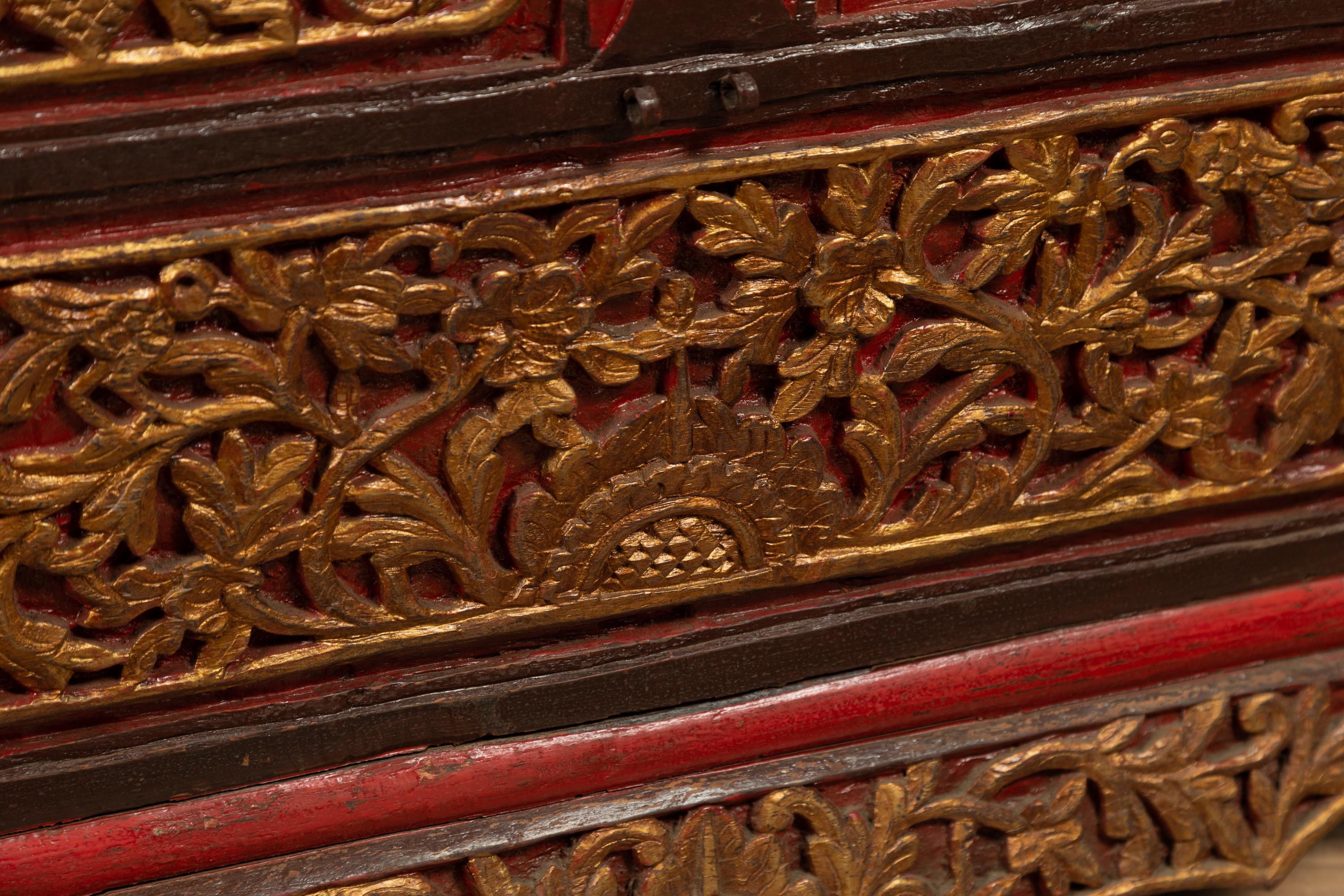 Indonesian Antique Madura Hand Carved Wooden Blanket Chest with Red, Brown and Gilt Accents For Sale