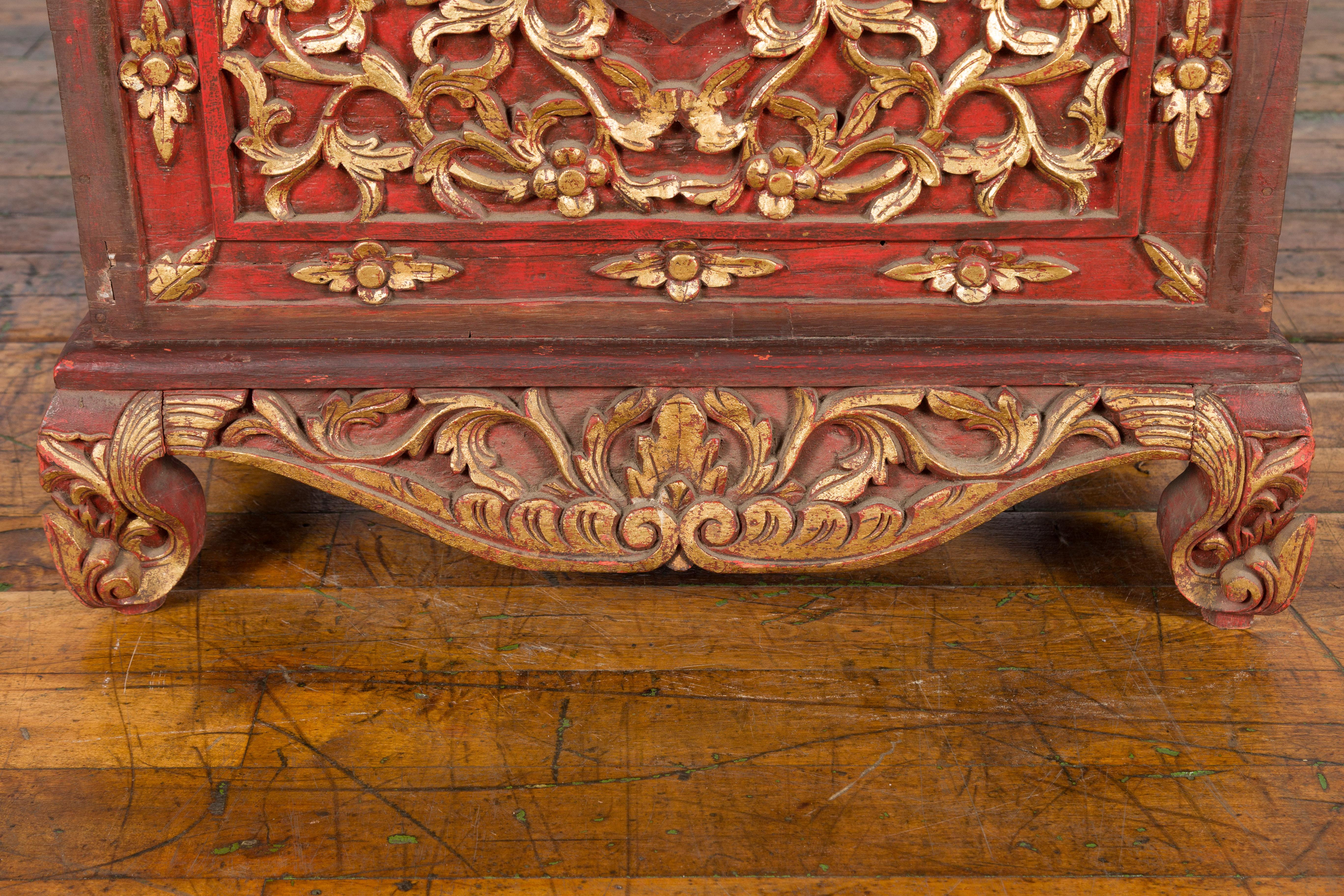 Antique Madura Hand Carved Wooden Treasure Chest with Red and Gold Décor For Sale 1