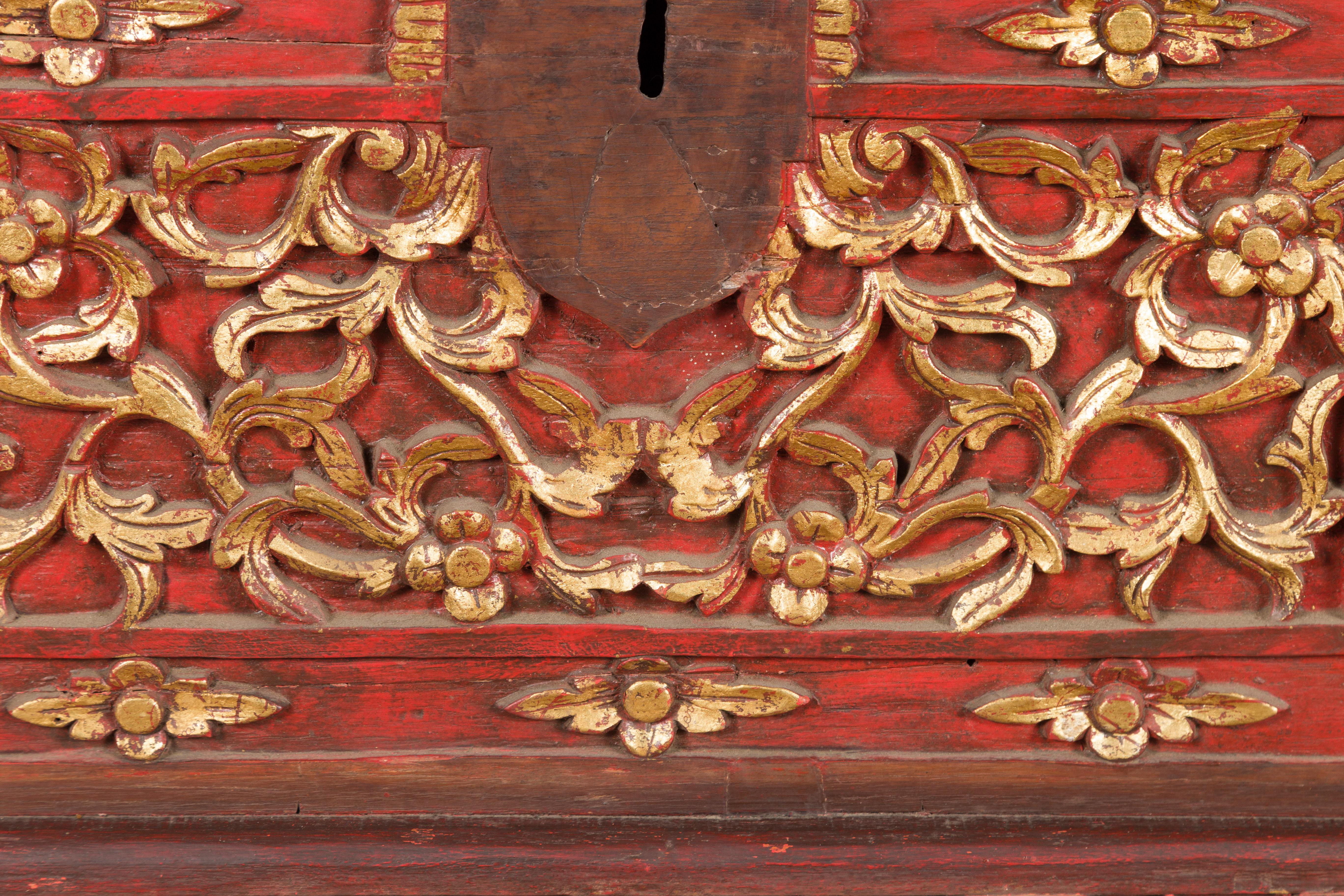 Antique Madura Hand Carved Wooden Treasure Chest with Red and Gold Décor In Good Condition For Sale In Yonkers, NY