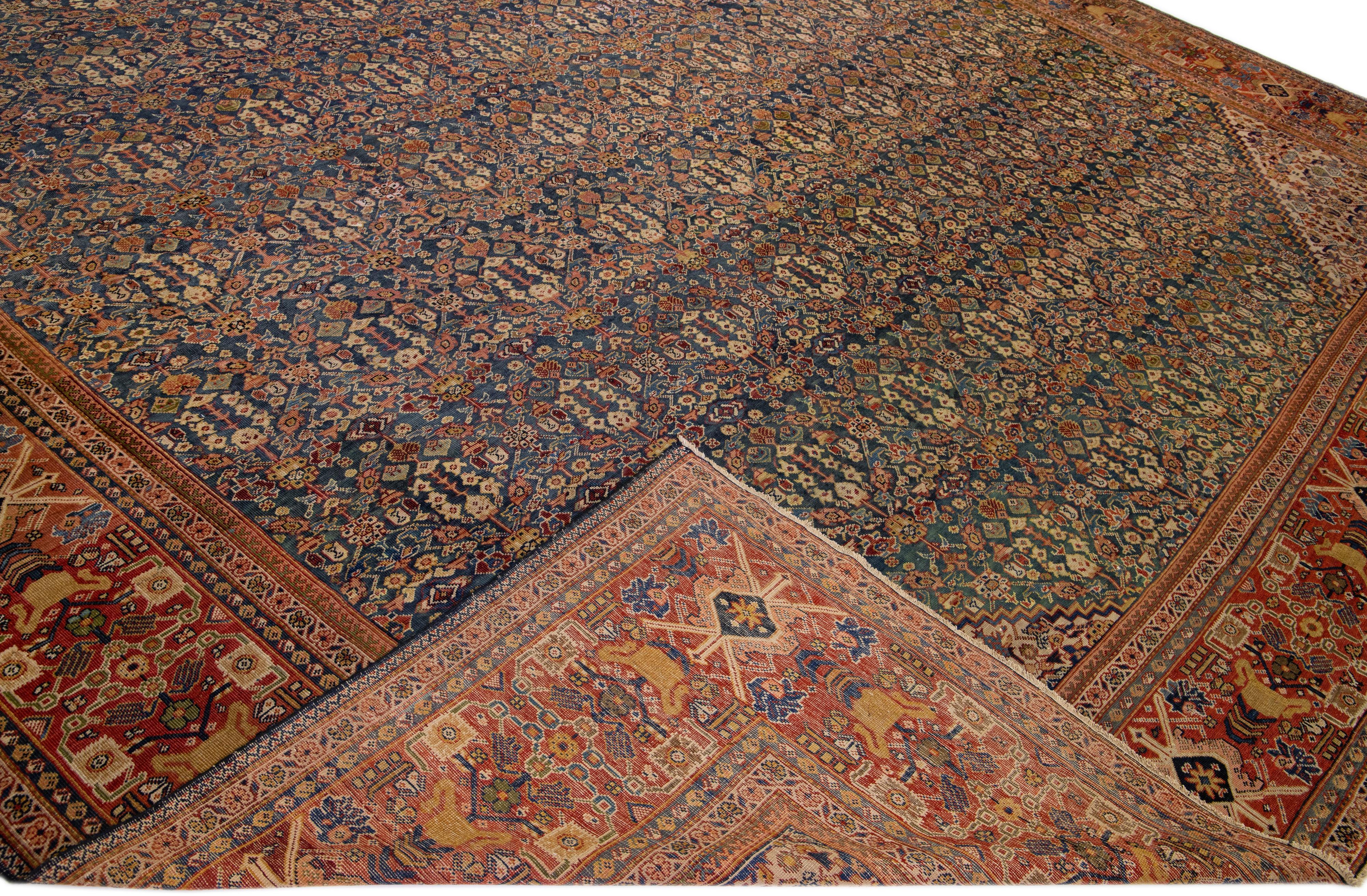 Schöner handgeknüpfter antiker Mahal-Wollteppich in Übergröße mit marineblauem Feld. Dieser Perserteppich hat rost-, braun- und hellbraune Akzentfarben und weist ein traditionelles geometrisches Muster auf. 

Dieser Teppich misst 14'3