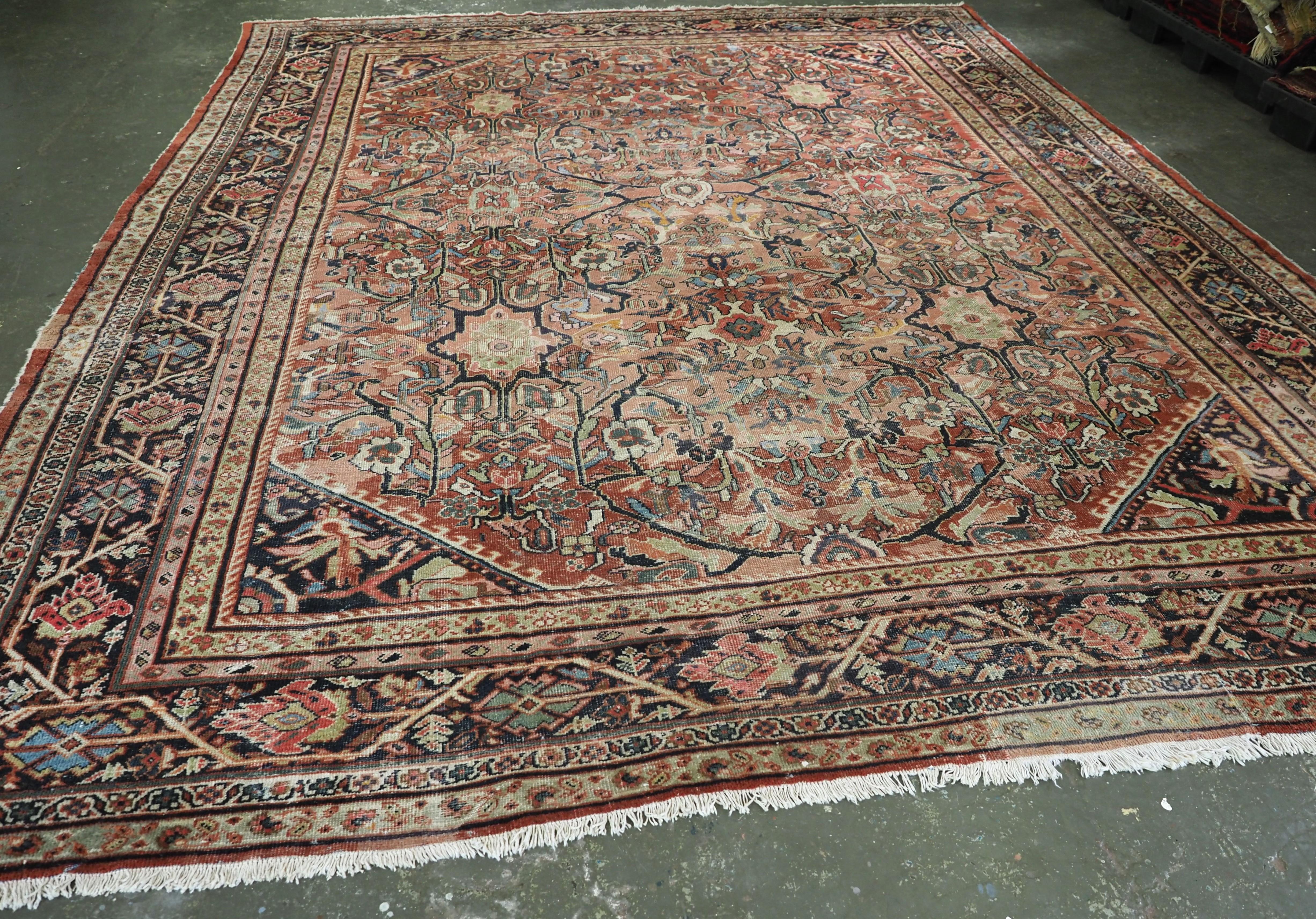 Size: 14ft 1in x 10ft 11in (430 x 332cm).

Antique Mahal carpet of very good large room size in pastel colours.

Circa 1900.

The carpet has an all over floral design in soft pastel colours with shades of pink and soft reds, the design highlights