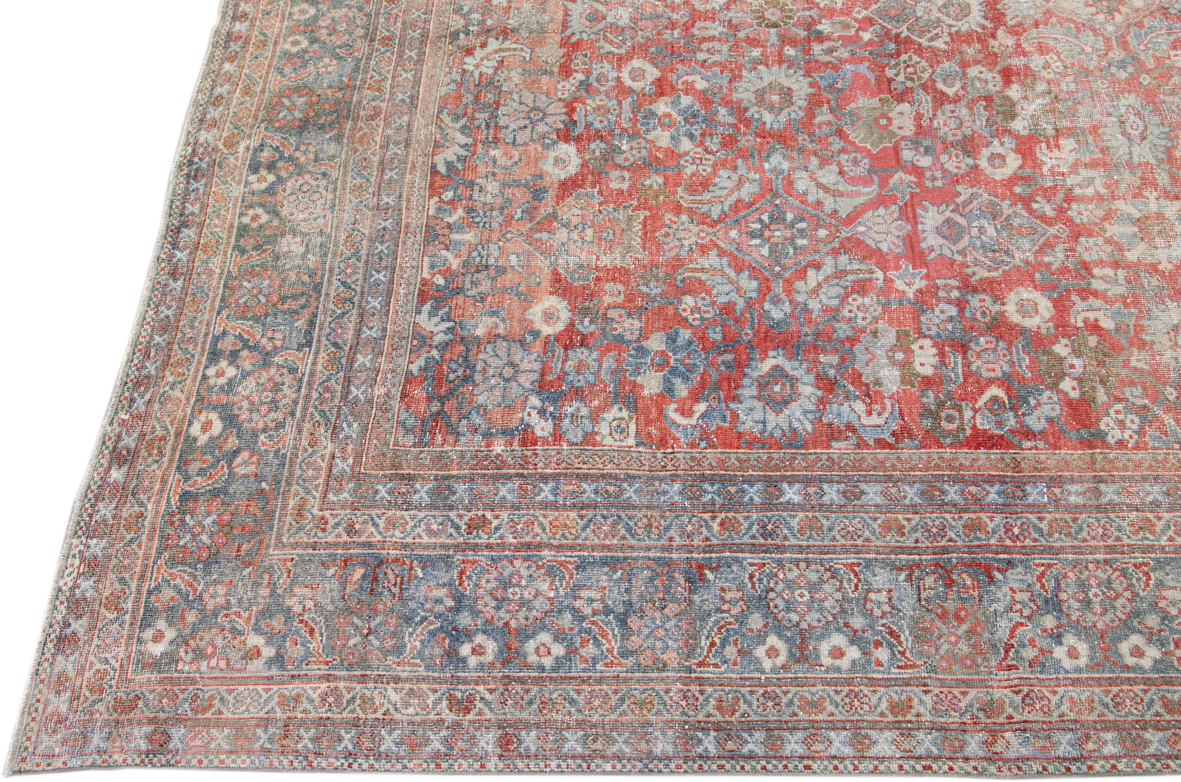 Persian Antique Mahal Handmade Oversize Red Wool Rug with Allover Design For Sale