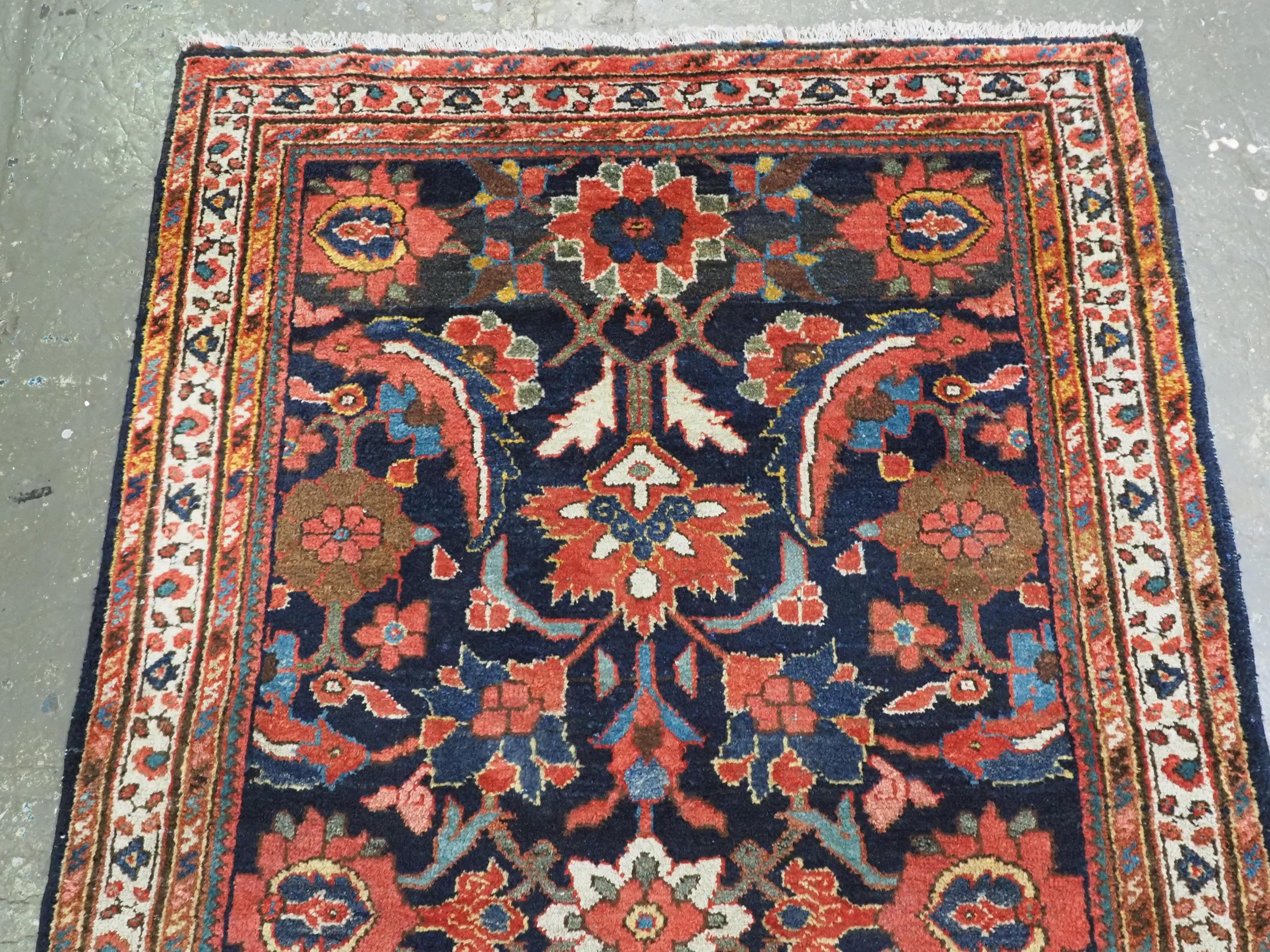 Caucasian  Antique Mahal rug with large scale floral design.  Circa 1920. For Sale