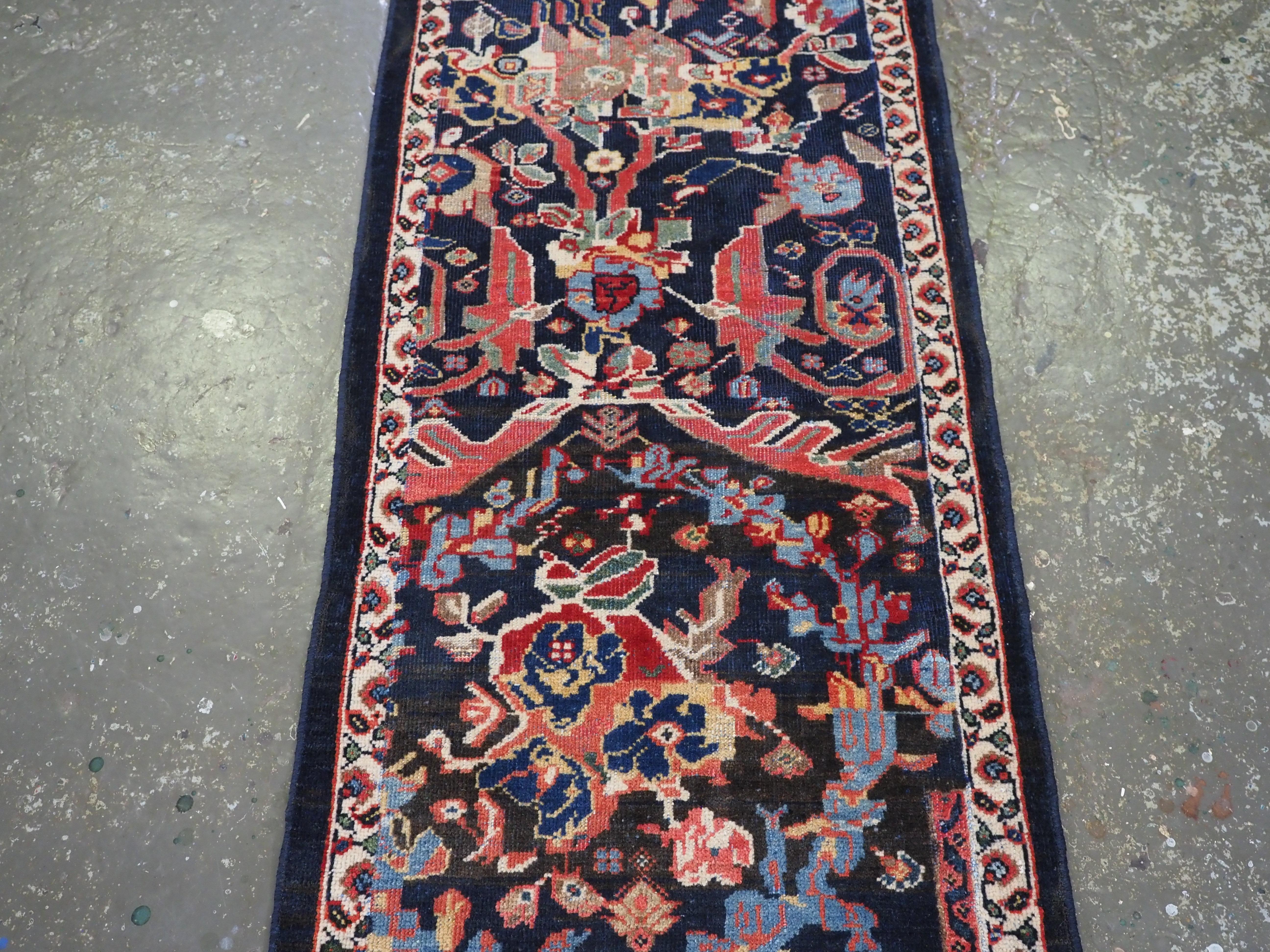Wool Antique Mahal runner of a very scarce narrow width.  Circa 1900. For Sale