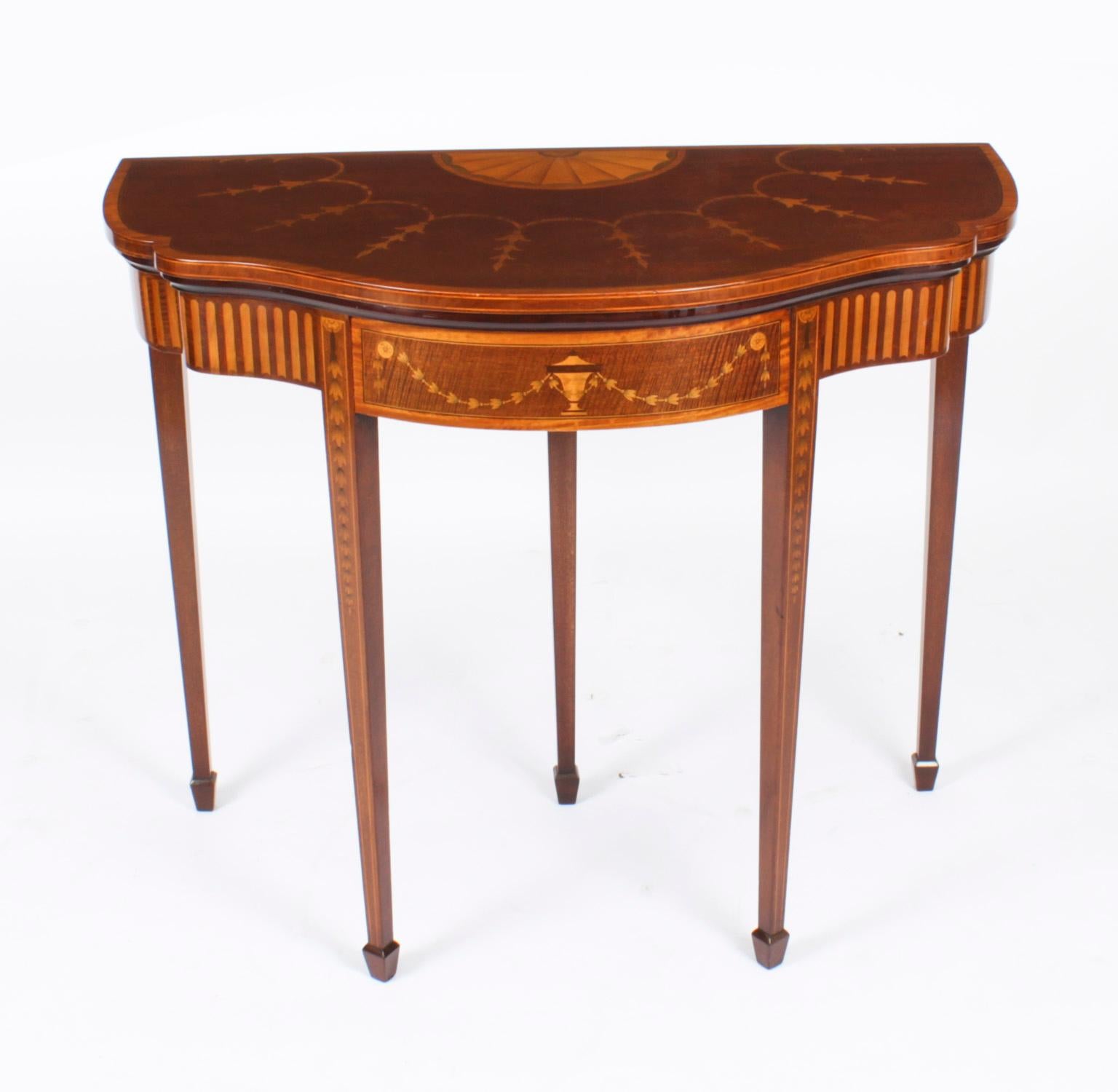 This is a superb antique mahogany serpentine fold-over card table, circa 1880 in date.
 
THE BOTANICAL NAME FOR THE MAHOGANY THAT THIS CARD TABLE IS MADE OF IS SWIETENIA MACROPHYLLA AND THIS TYPE OF MAHOGANY IS NOT SUBJECT TO CITES REGULATION.

This