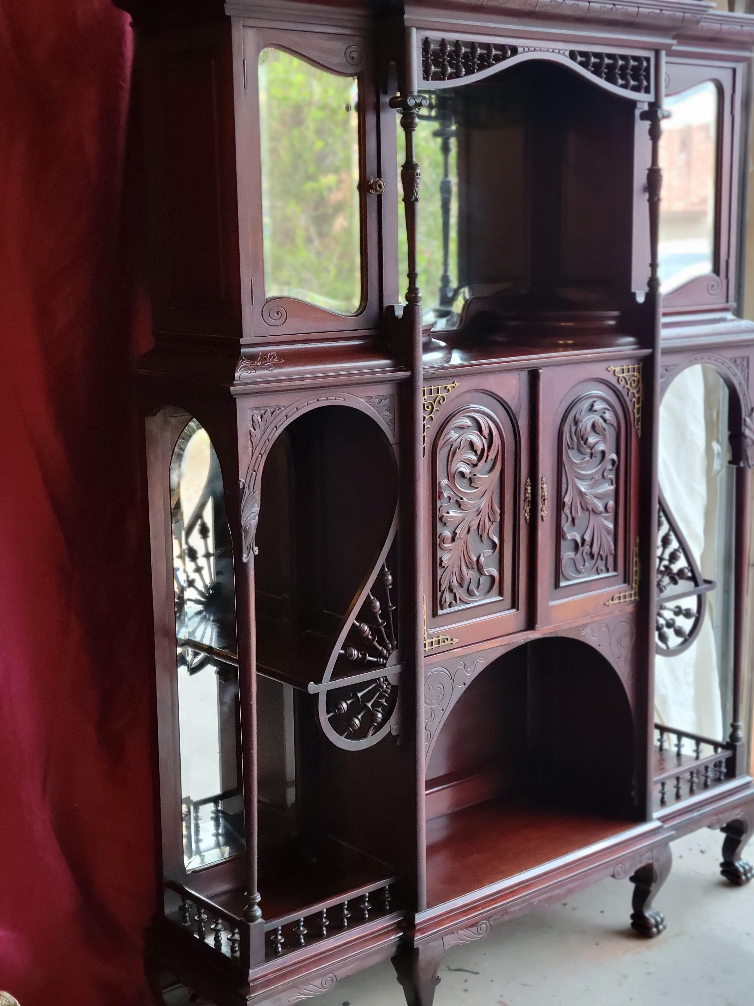 Antique solid wood art nouveau etagere. The wood is very heavy and has a high dencity: might be rosewood or a heavy mahogany. Solid and heavy. 74
