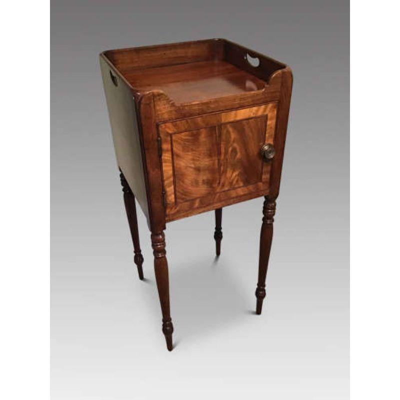 Antique Mahogany Bedside Cabinet

A Geo III mahogany tray top pot cupboard.C1800

Dimensions: W: 35cm (13.8