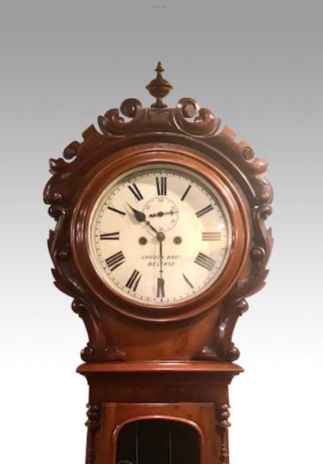 Fabulous antique Belfast Victorian 
African mahogany drum head Longcase Clock 
by Cahoon Bros Belfast.
Circa 1860.
Measures: 85.5ins tall x 9ins x 25 ins wide at base.